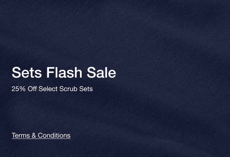 Promotional text for a flash sale on scrub sets with a midnight navy blue background: Sets Flash Sale, 25% Off Select Scrub Sets.