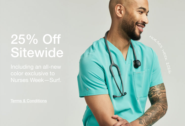 Smiling male nurse in a Surf teal Jaanuu scrub top with a stethoscope. Text reads "25% Off Sitewide — Including an all-new color exclusive to Nurses Week—Surf." with a curved "Nurses Week 2026" stamp.