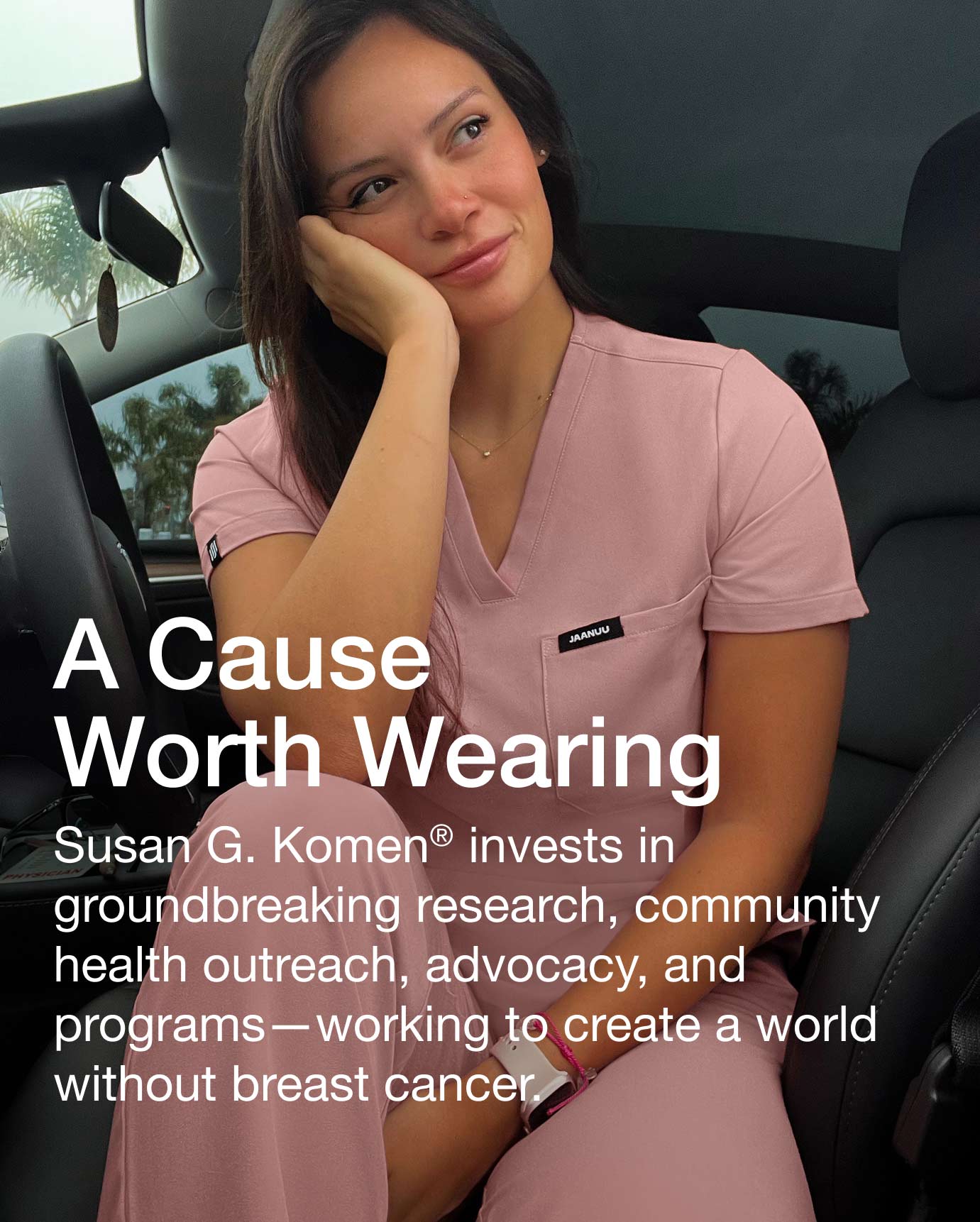 A woman wearing Mauve scrubs with text over the image saying, "A Cause Worth Wearing: Susan G. Komen® invests in groundbreaking research, community, health outreach, advocacy, and programs—working to create a world without breast cancer.