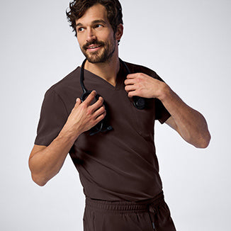 Man wearing Espresso colored scrubs. - Men Nav Tile