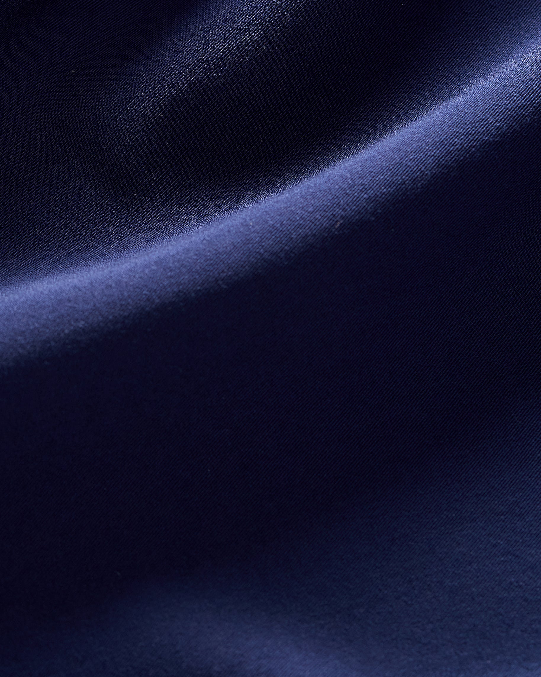 Close-up of smooth navy scrub fabric