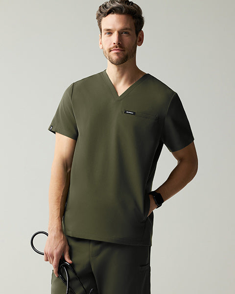 Man wearing Deep Olive colored scrubs. - Men Nav Tile