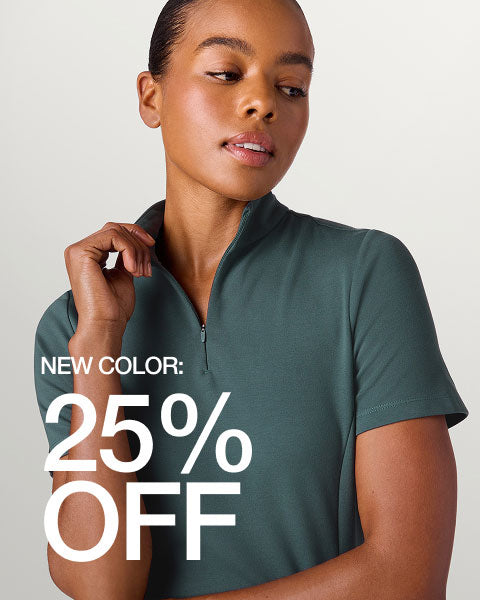 Image of woman wearing Alpine Green scrubs. Image has text, New Color: 25% Off" - Women Nav Tile