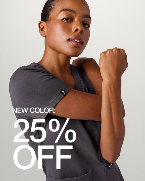 Image of woman wearing Harbor Gray scrubs. Image has text, New Color: 25% Off" - Women Nav Tile