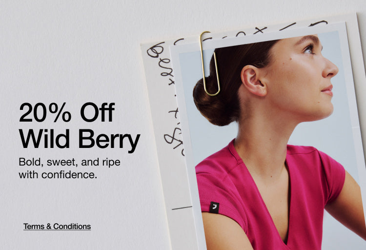 Image of woman wearing a Wild Berry colored scrub top. Image has text, "20% Off Wild Berry. Bold, sweet, and ripe with confidence. Click to see Terms and Conditions."