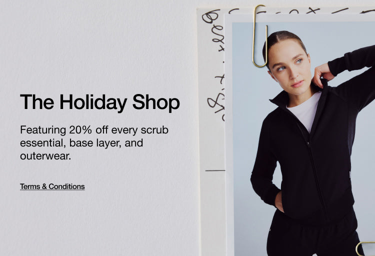 Image of a healthcare provider wearing scrubs and a scrub jacket. Image has text, "The Holiday Shop: Featuring 20% off every scrub essential, base layer, and outerwear. Click to view Terms and Conditions."