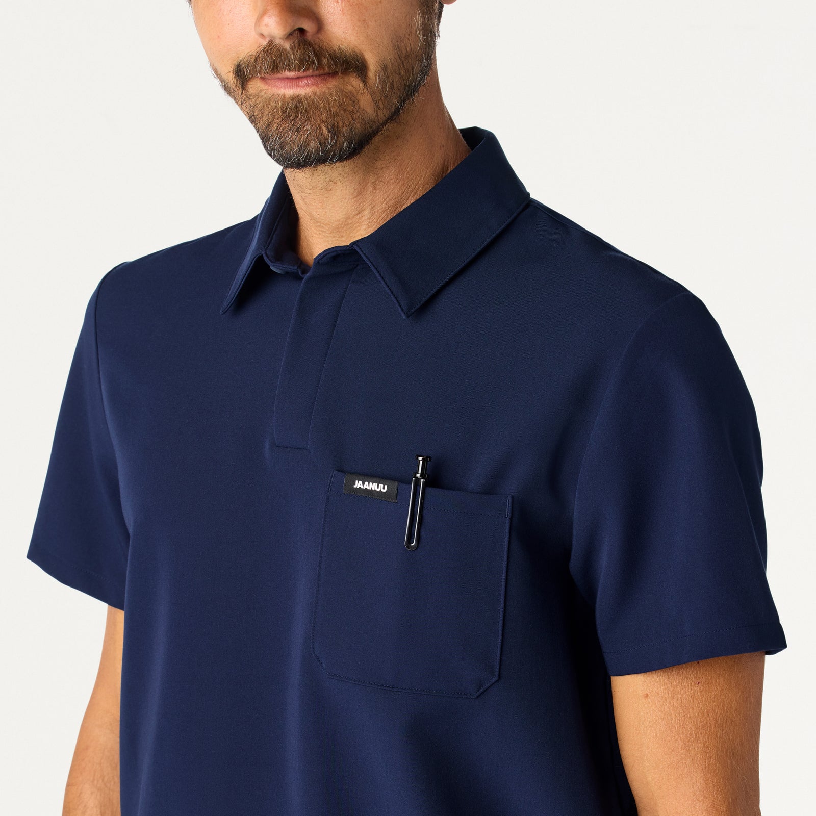 Calderon Polo Scrub Top - Midnight Navy on-body detail