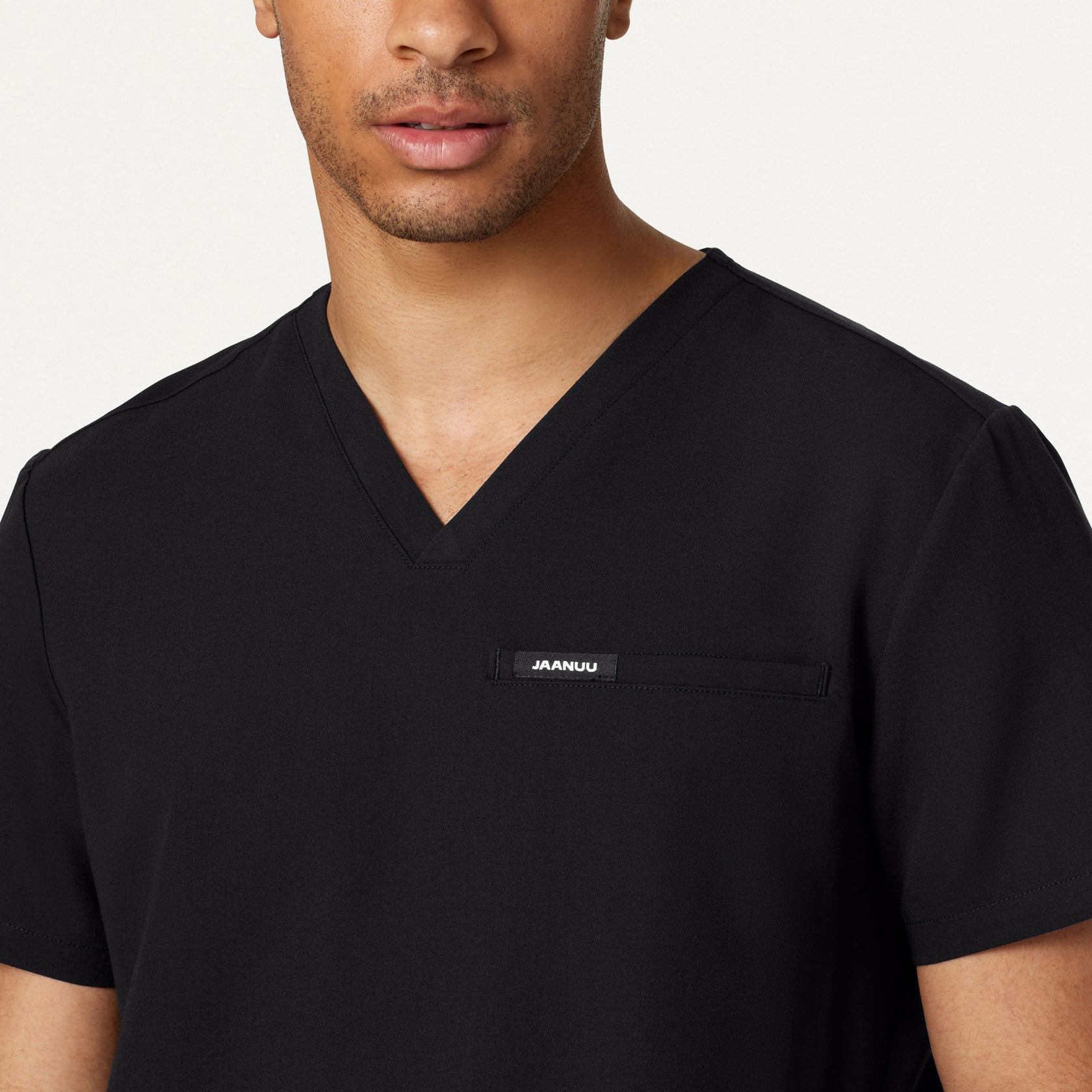 Platt 3-Pocket Scrub Top - Black on-body detail