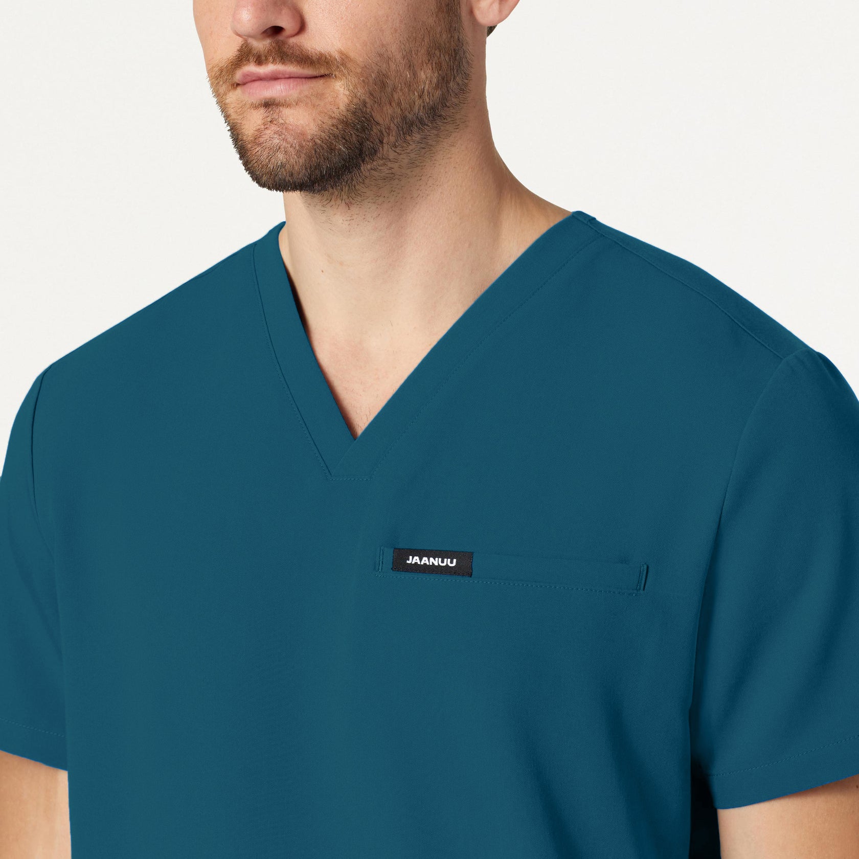 Platt 3-Pocket Scrub Top - Caribbean Blue on-body detail