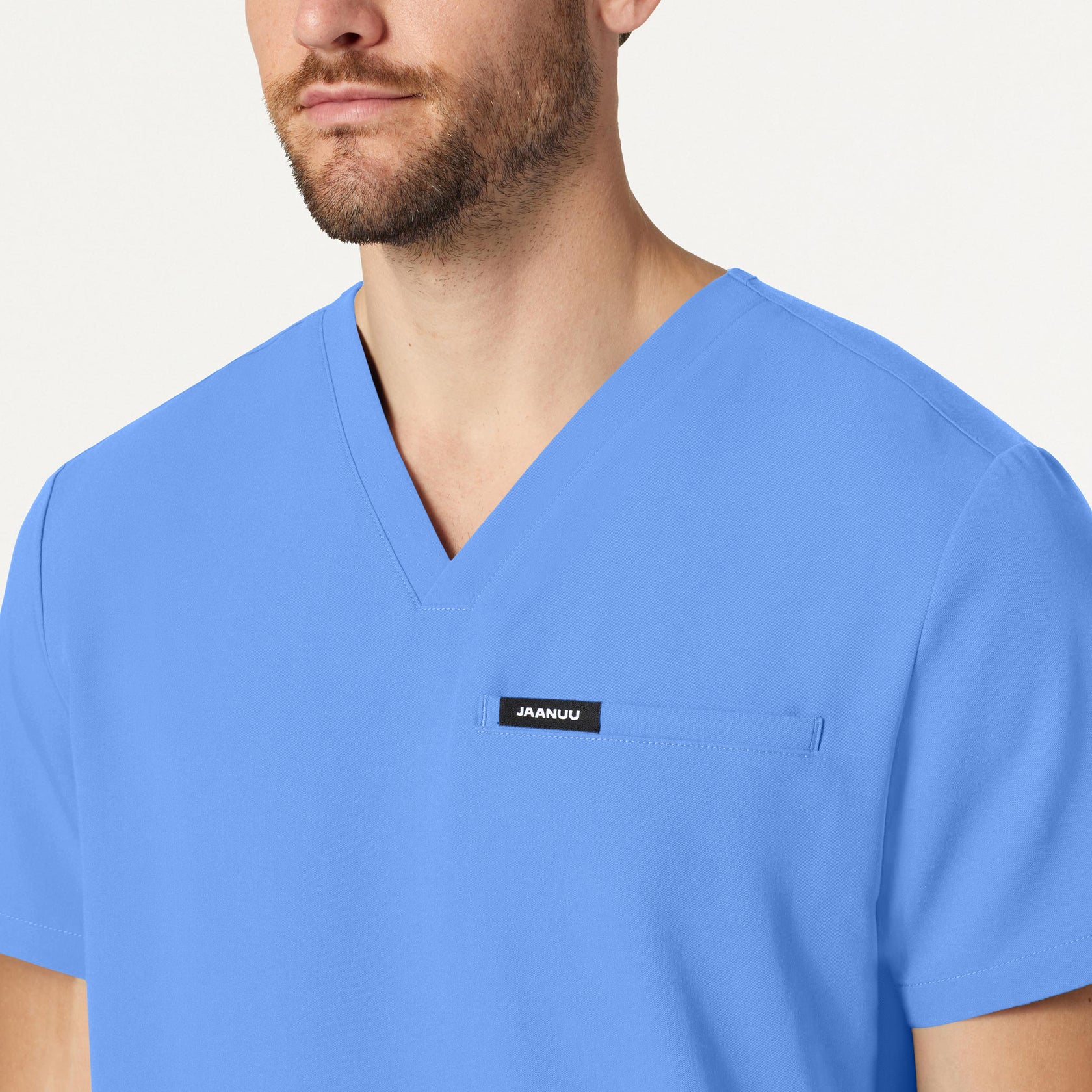 Platt 3-Pocket Scrub Top - Ceil Blue on-body detail