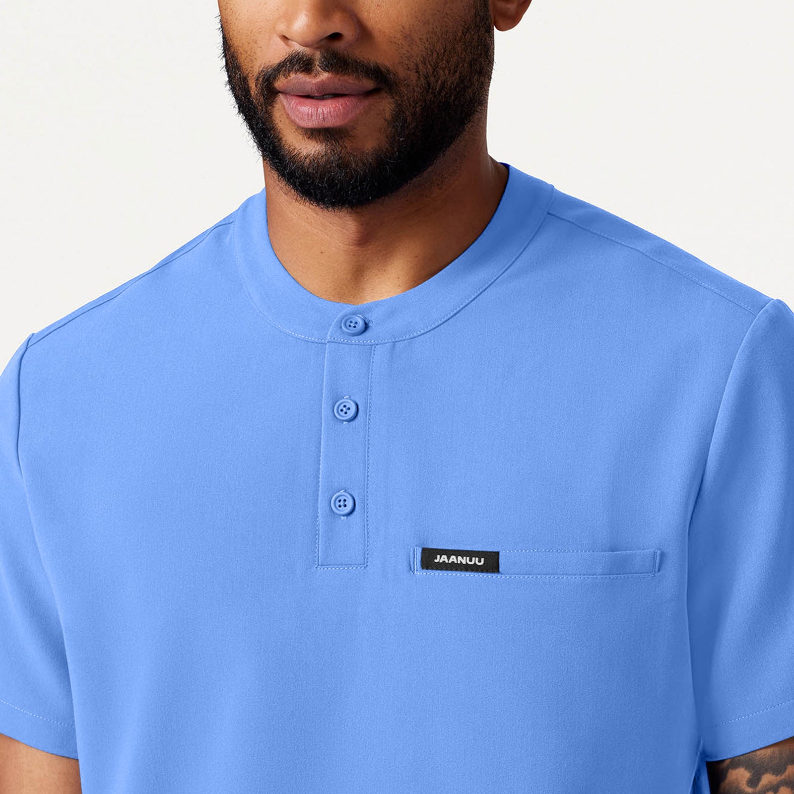 Reeve Henley Scrub Top - Ceil Blue on-body detail