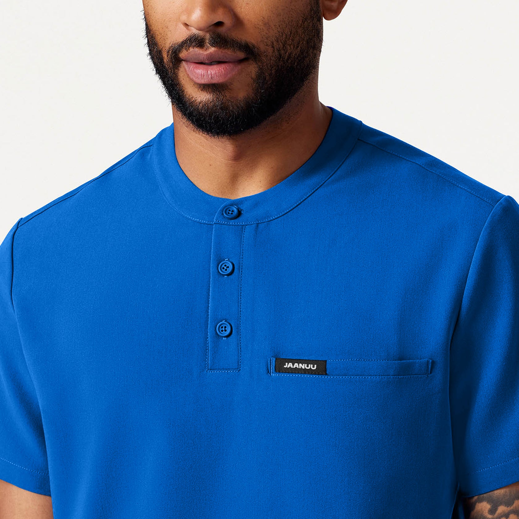 Reeve Henley Scrub Top - Royal Blue on-body detail