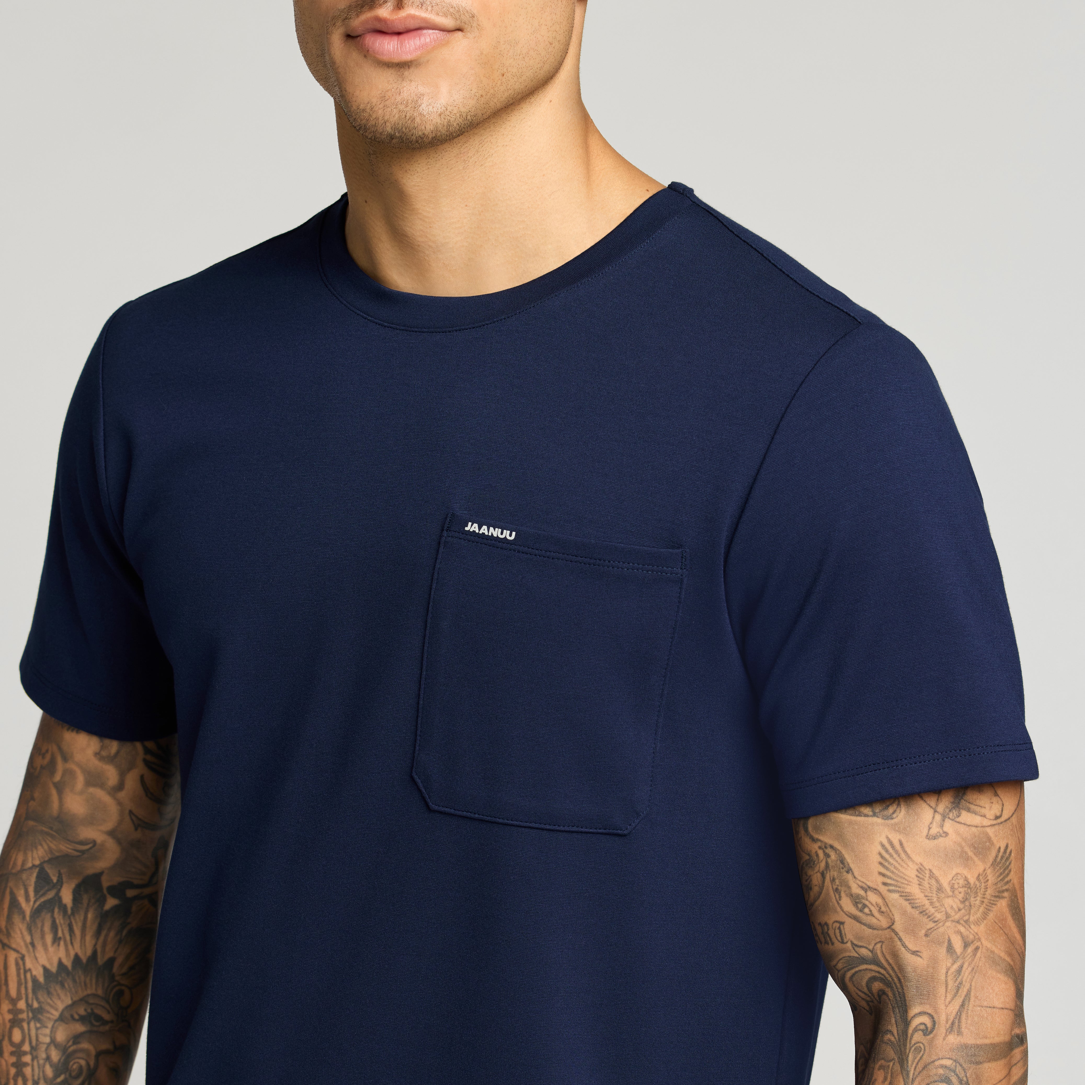 Finn Crewneck UltraSOFT Scrub Top - Midnight Navy on-body detail