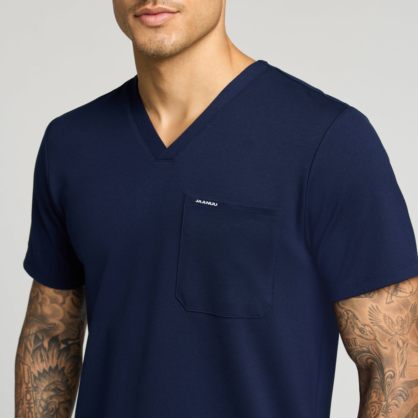 Asher Slim UltraSOFT™ Scrub Top - Midnight Navy on-body detail