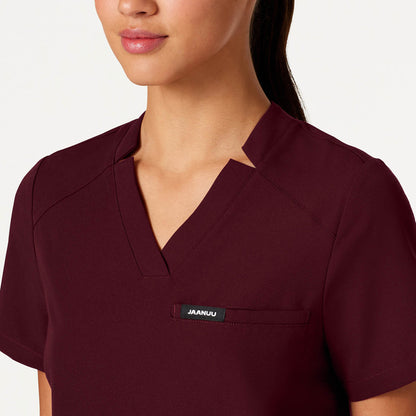 Helia Notched V-Neck Scrub Top - Burgundy on-body detail