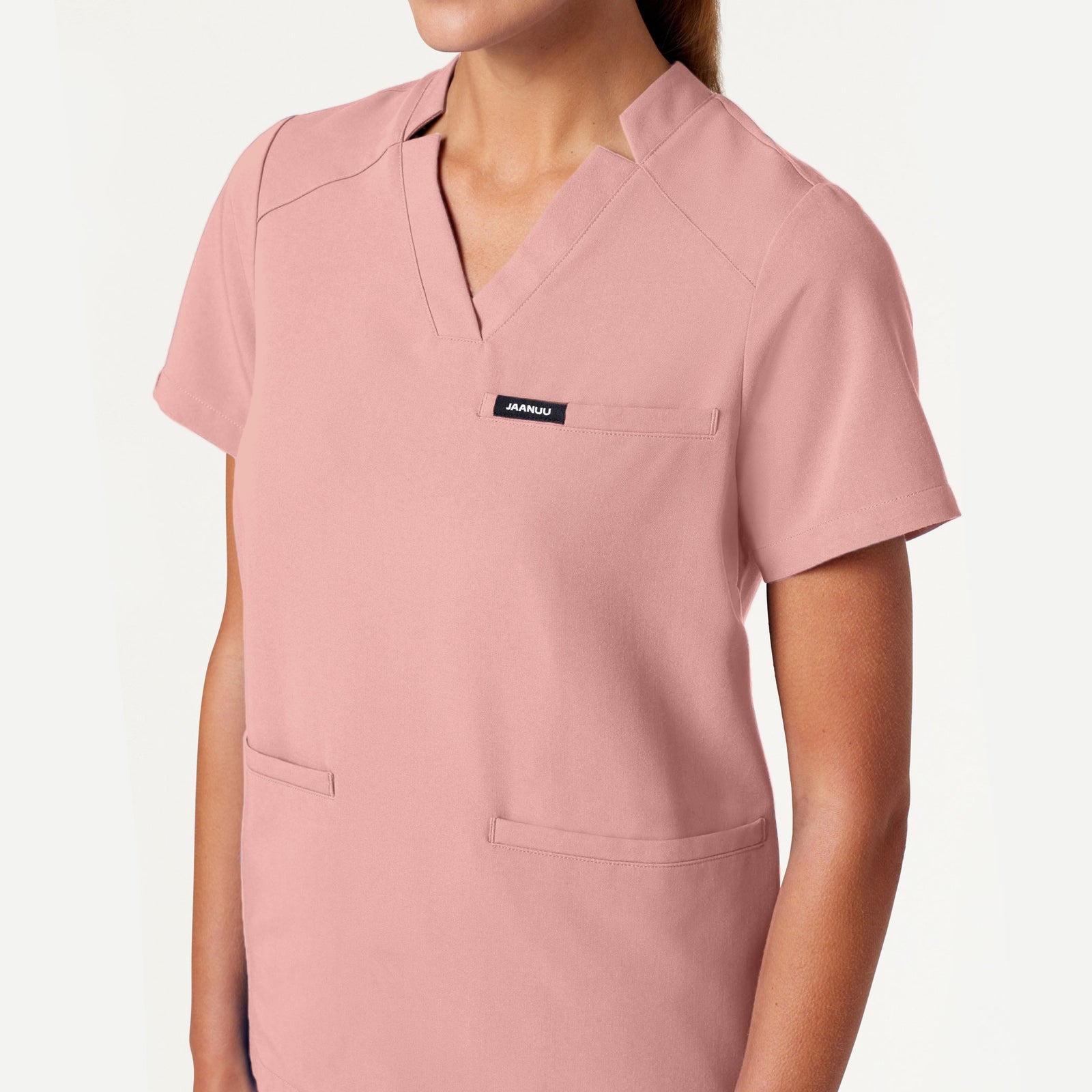 Helia Notched V-Neck Scrub Top - Mauve on-body detail