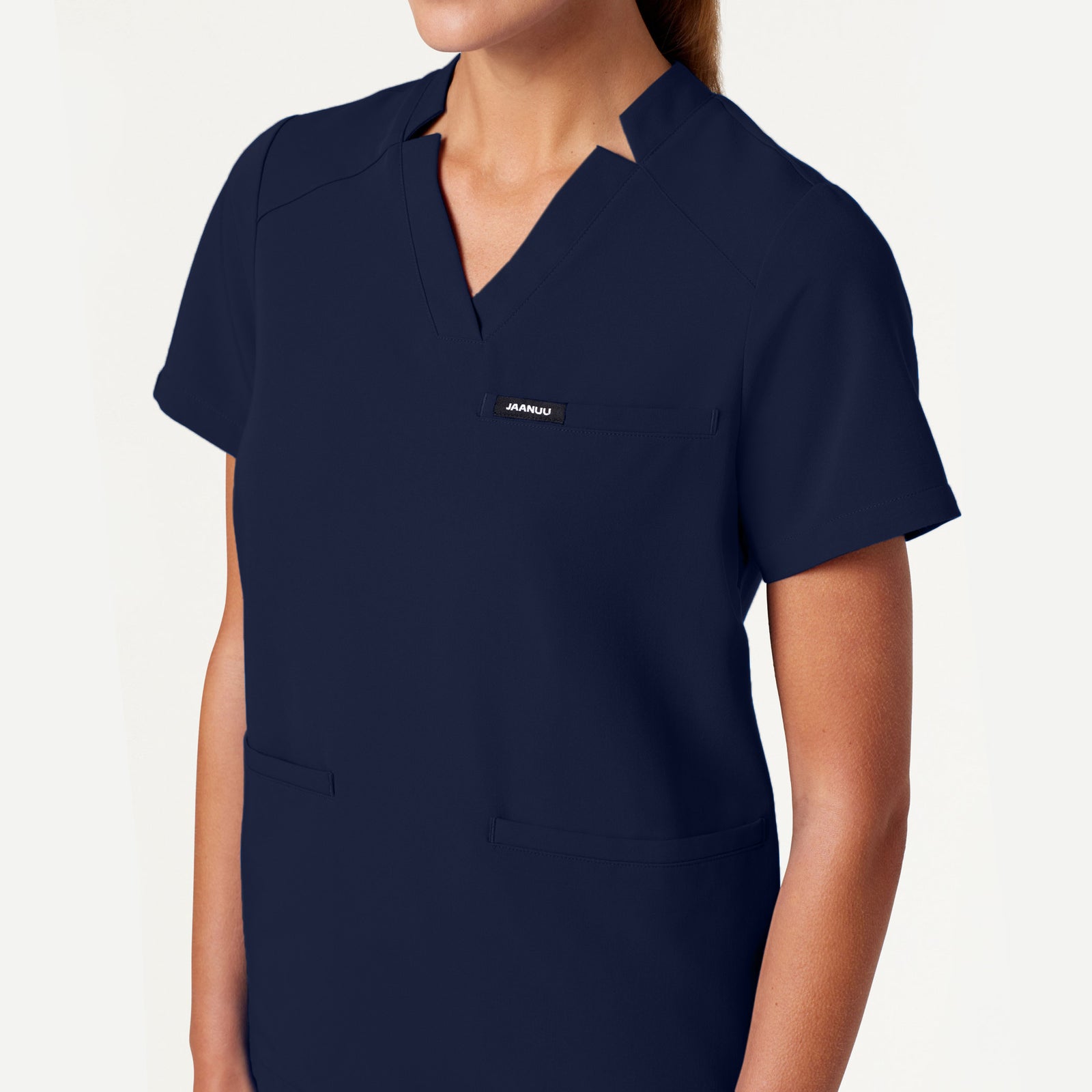 Helia Notched V-Neck Scrub Top - Midnight Navy on-body detail