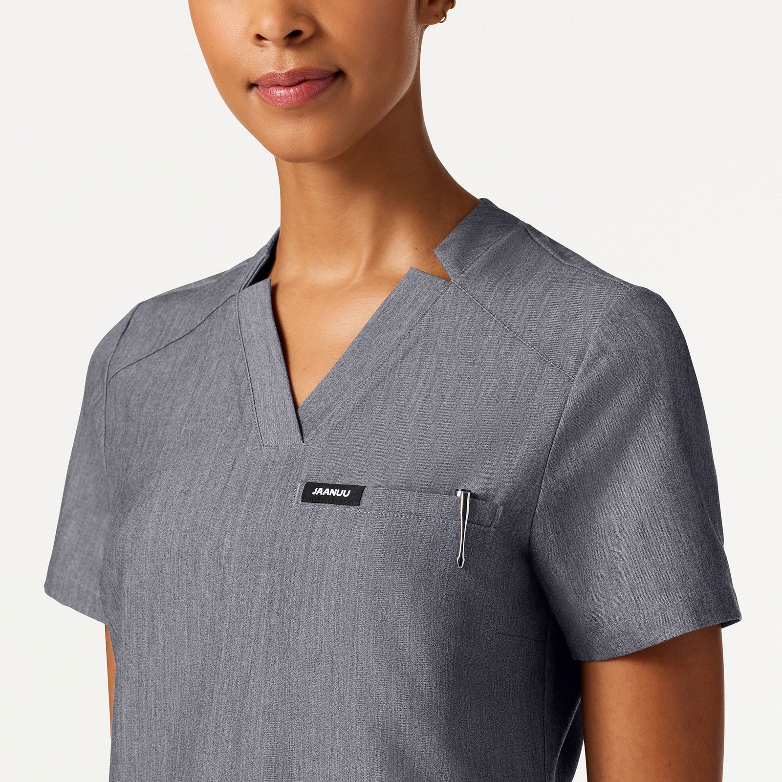 Helia Slim Notched V-Neck Scrub Top - Heather Gray on-body detail