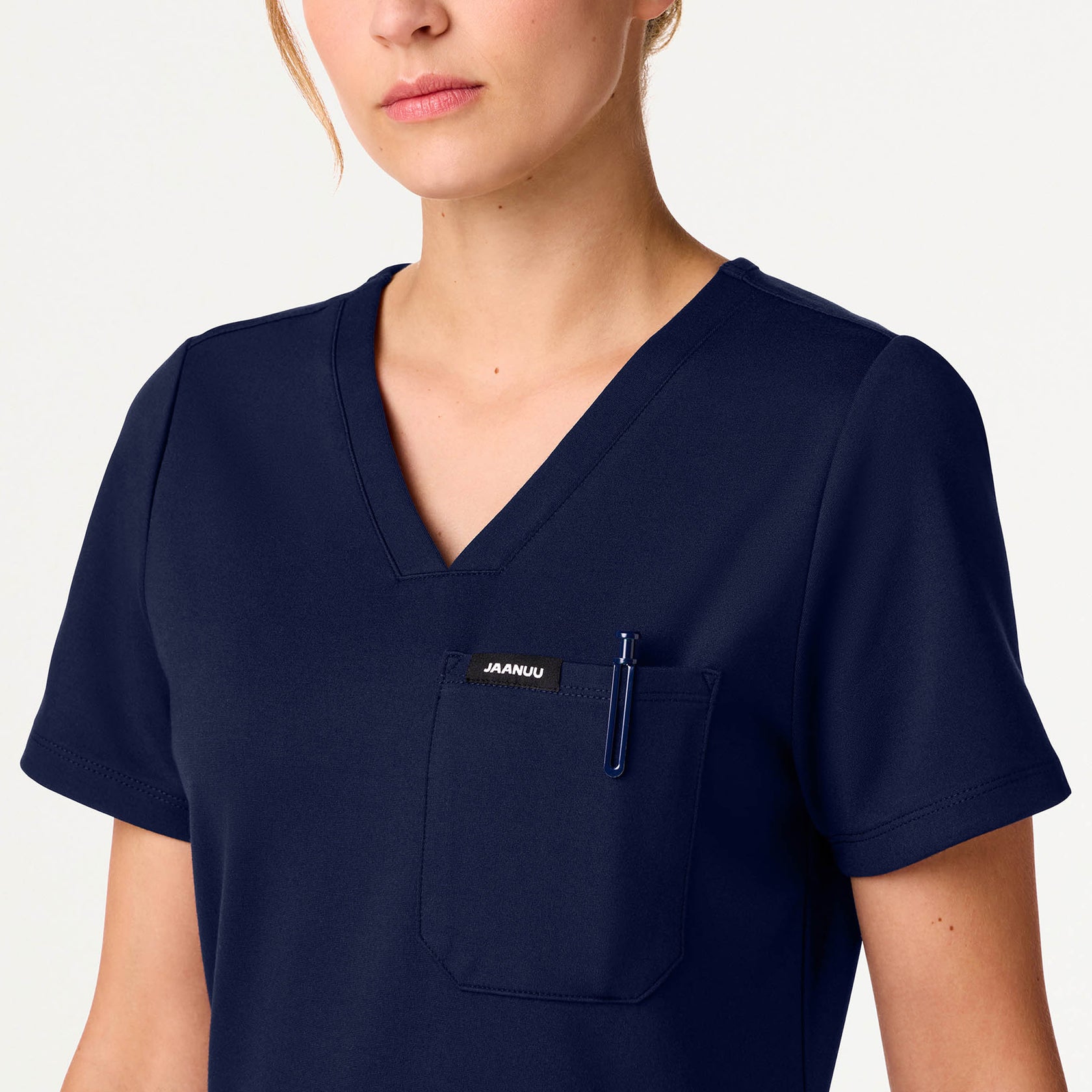 Rhena Slim UltraSOFT™ Scrub Top - Midnight Navy on-body detail