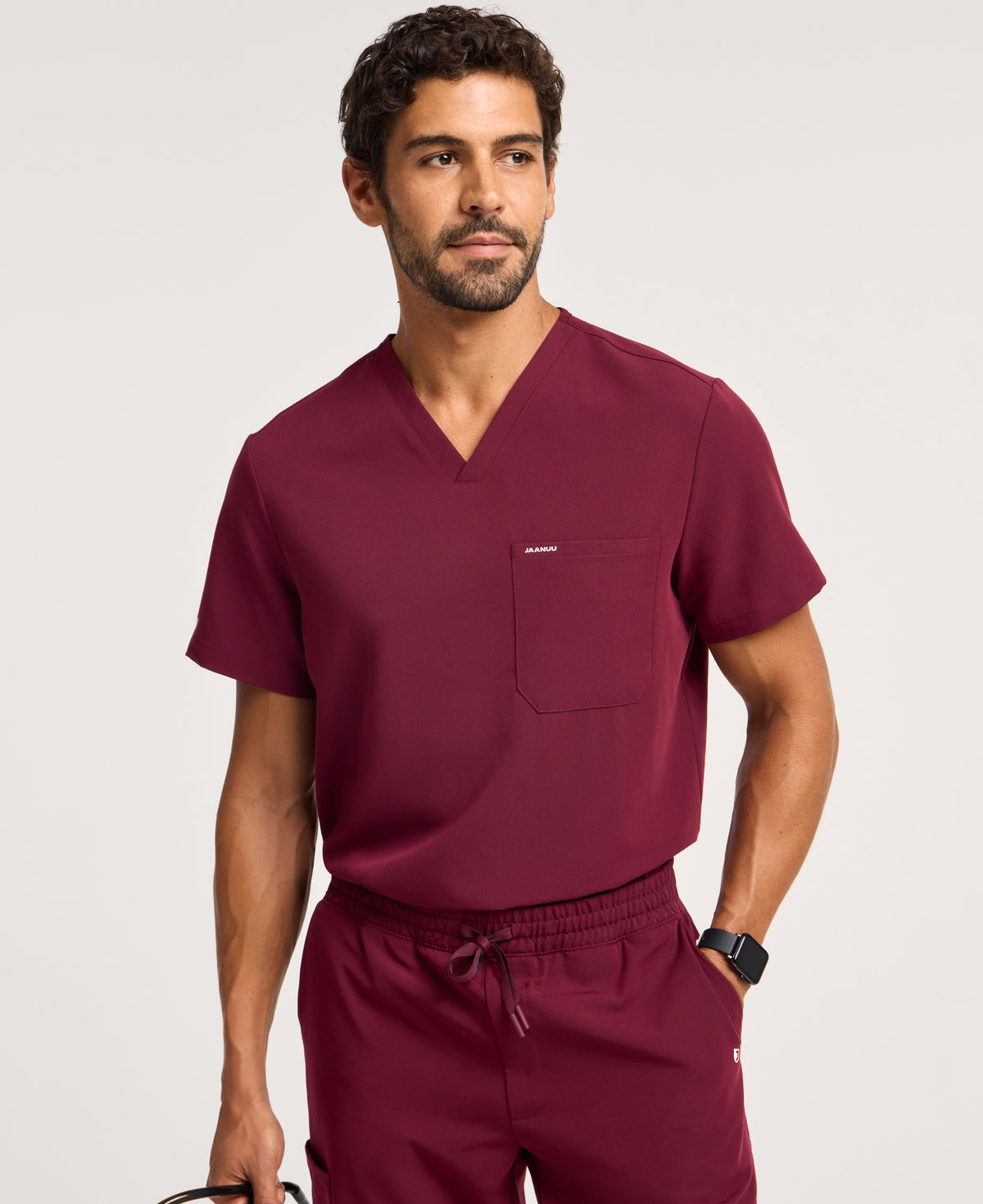 Jaanuu Holmes 1-Pocket Scrub Top in Burgundy, product photo 1 of 6