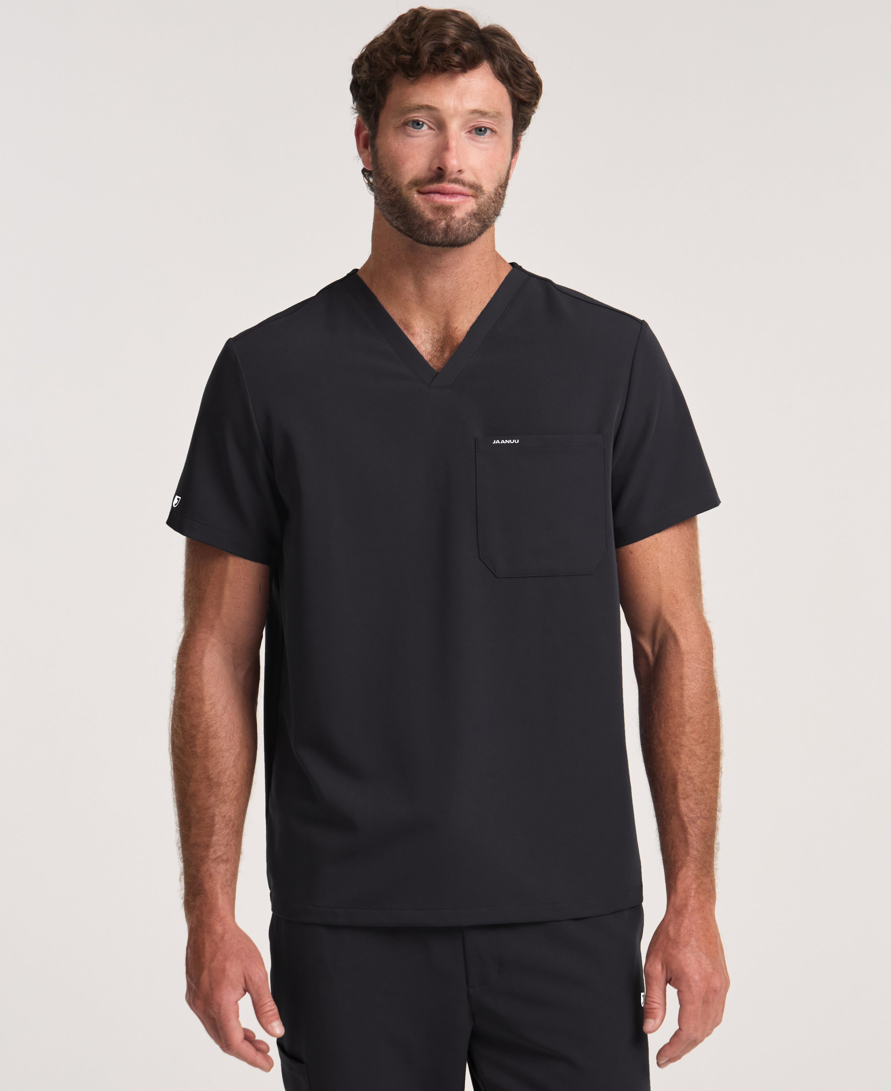 Jaanuu Holmes 1-Pocket Scrub Top in Black, product photo 3 of 6