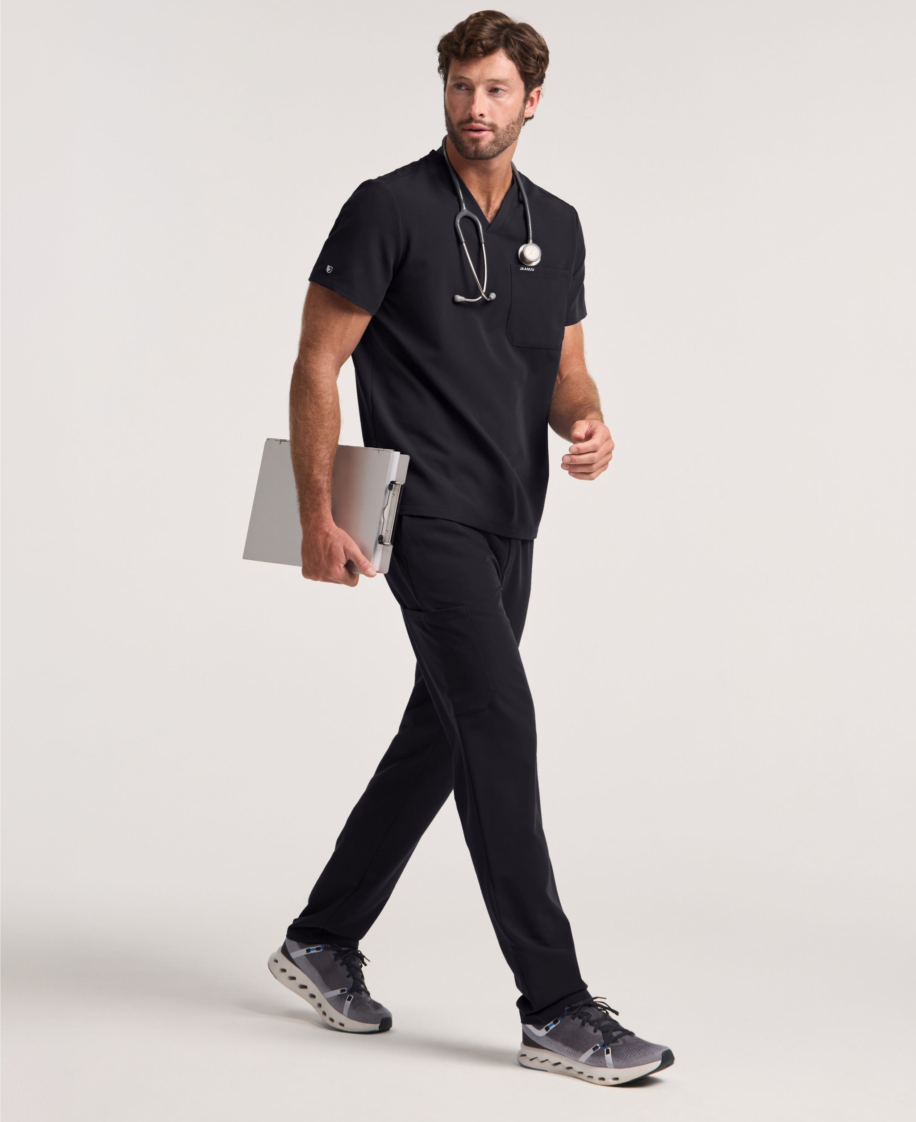 Jaanuu Holmes 1-Pocket Scrub Top in Black, product photo 4 of 6