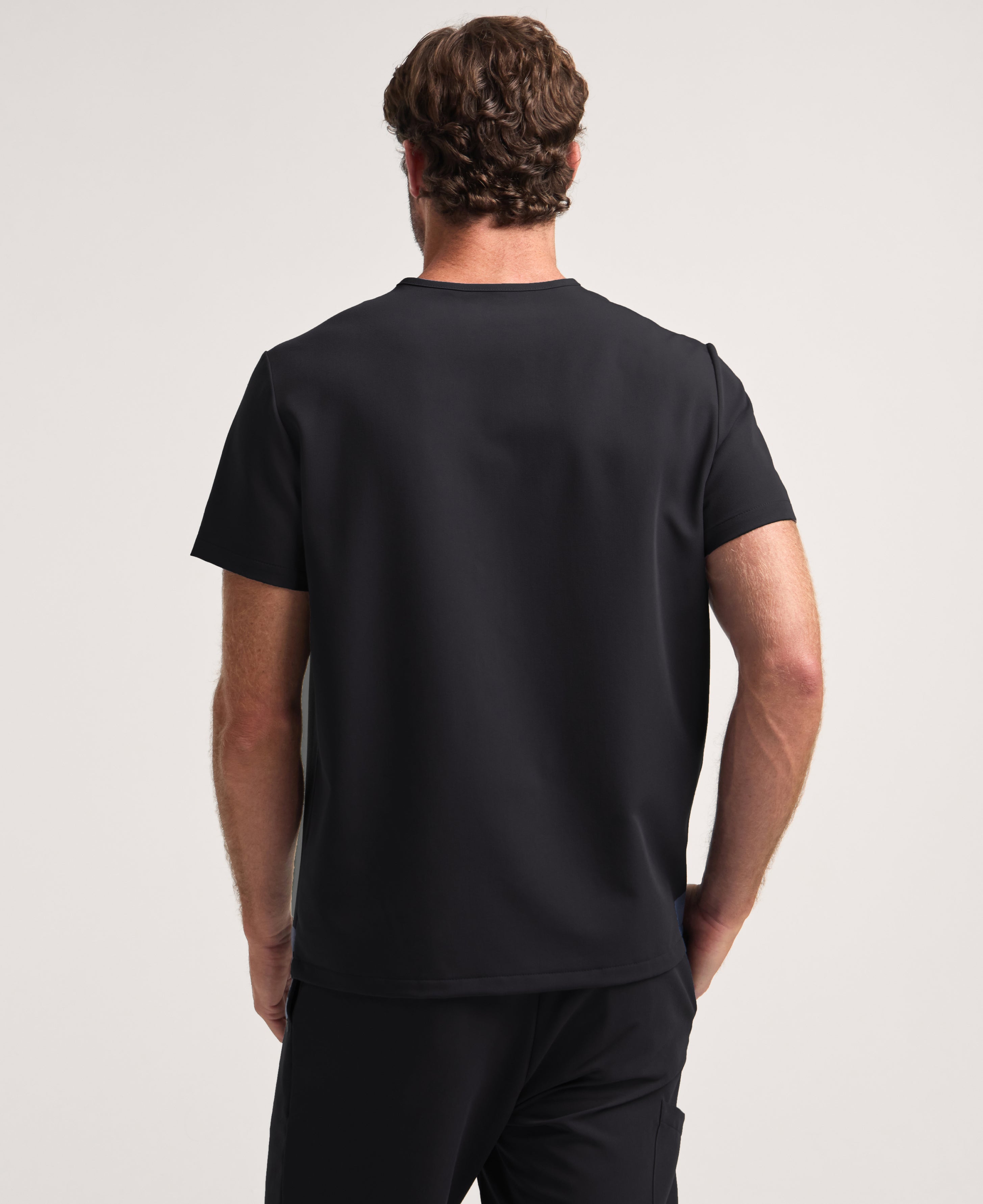 Jaanuu Holmes 1-Pocket Scrub Top in Black, product photo 6 of 6