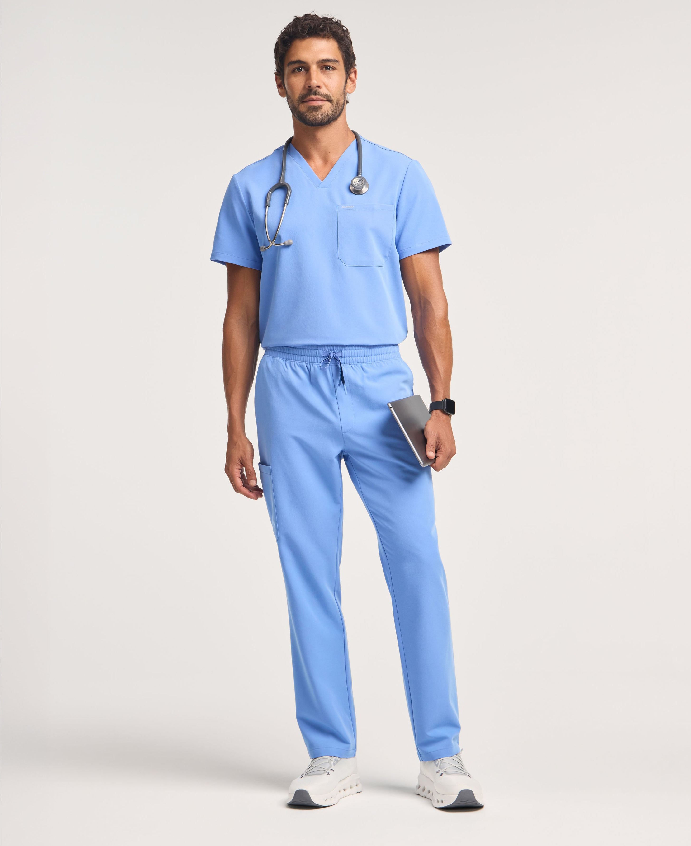 Jaanuu Holmes 1-Pocket Scrub Top in Ceil Blue, product photo 5 of 6