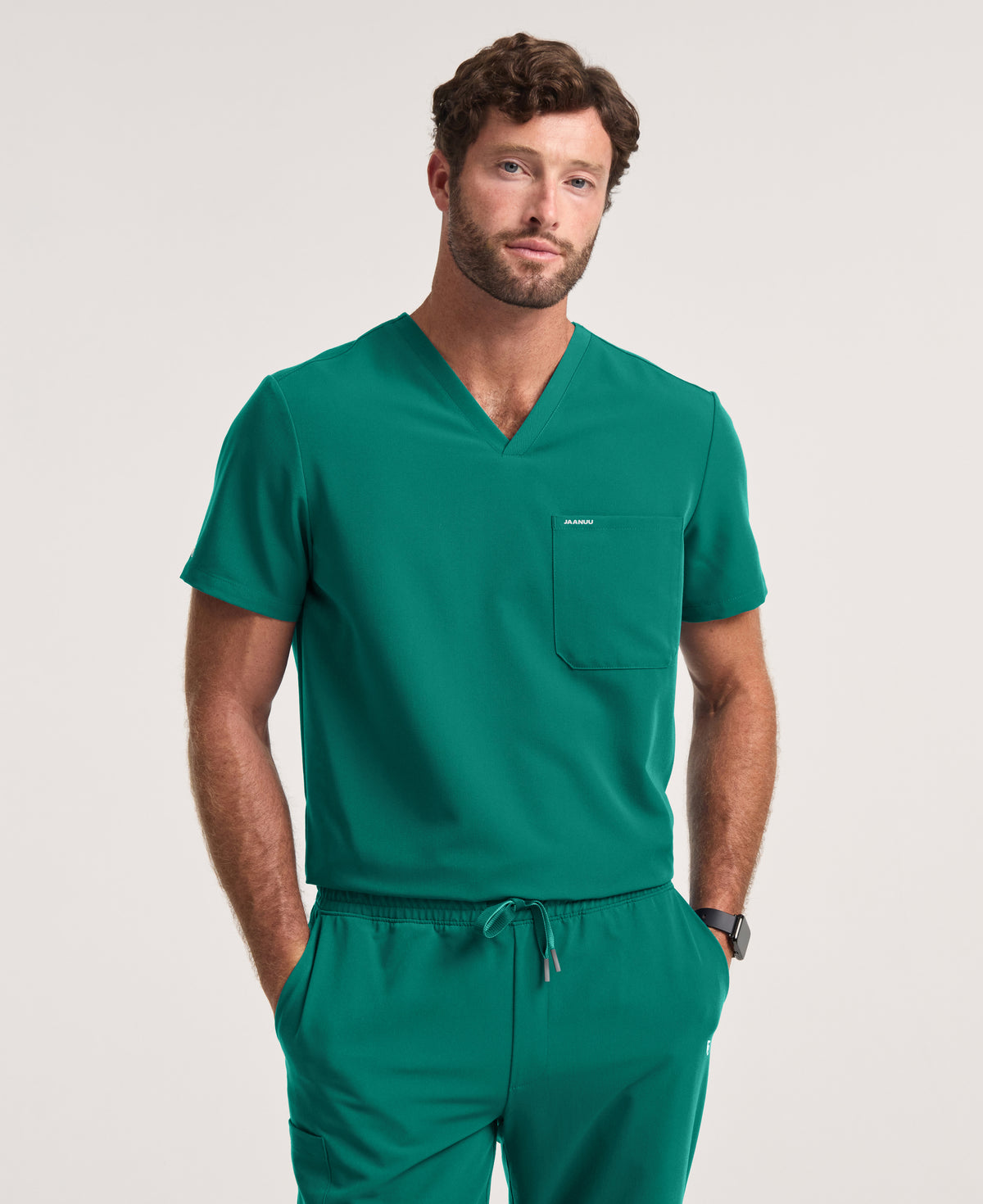 Jaanuu Holmes 1-Pocket Scrub Top in Hunter Green, product photo 1 of 6