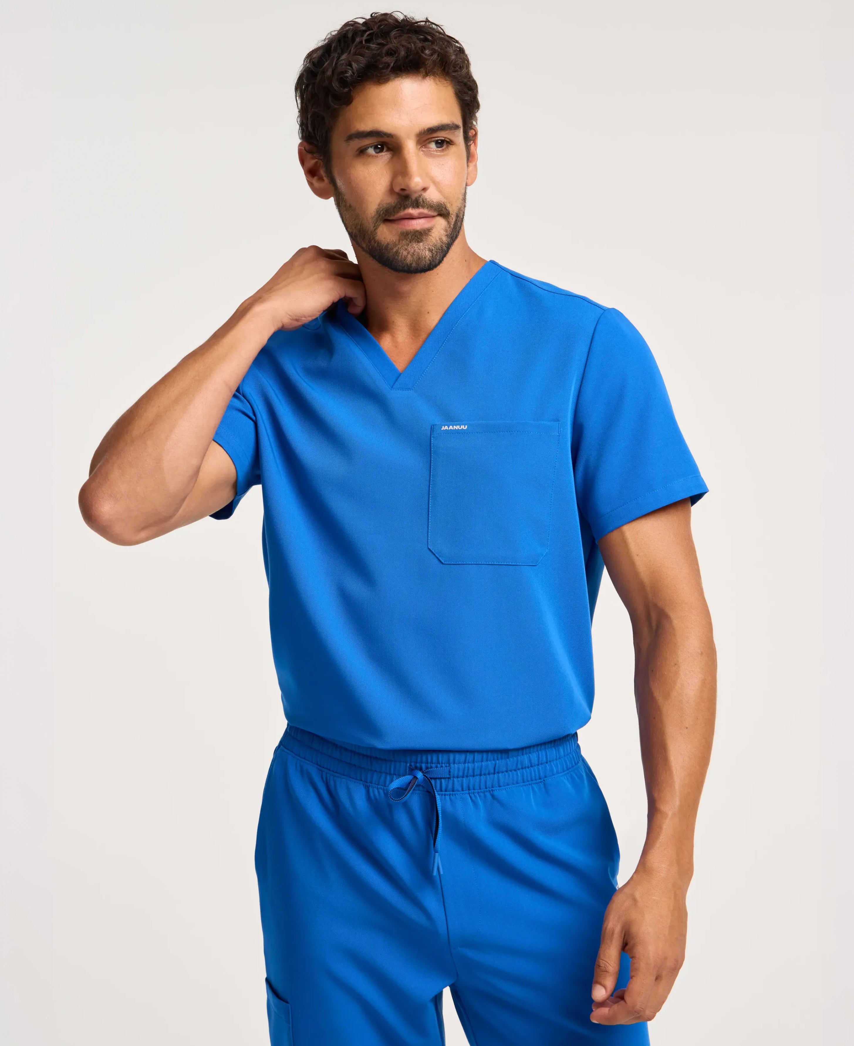 Jaanuu Holmes 1-Pocket Scrub Top in Royal Blue, product photo 2 of 6