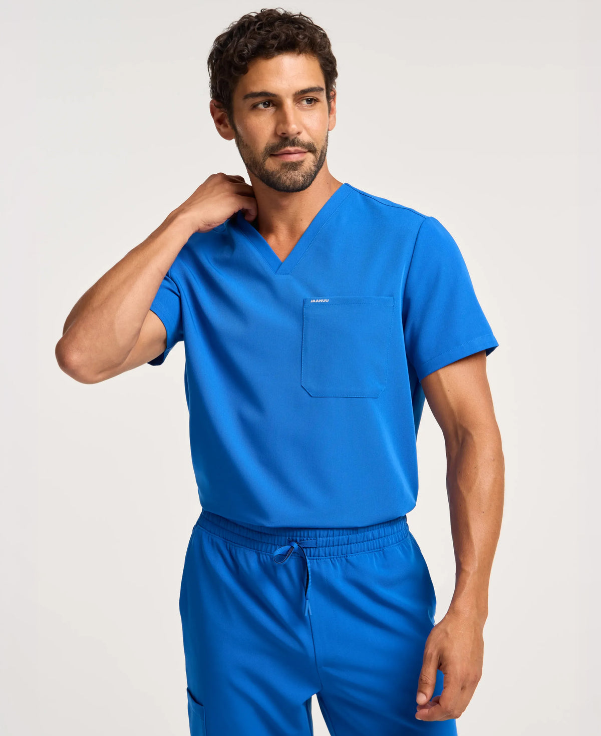 Jaanuu Holmes 1-Pocket Scrub Top in Royal Blue, product photo 2 of 6