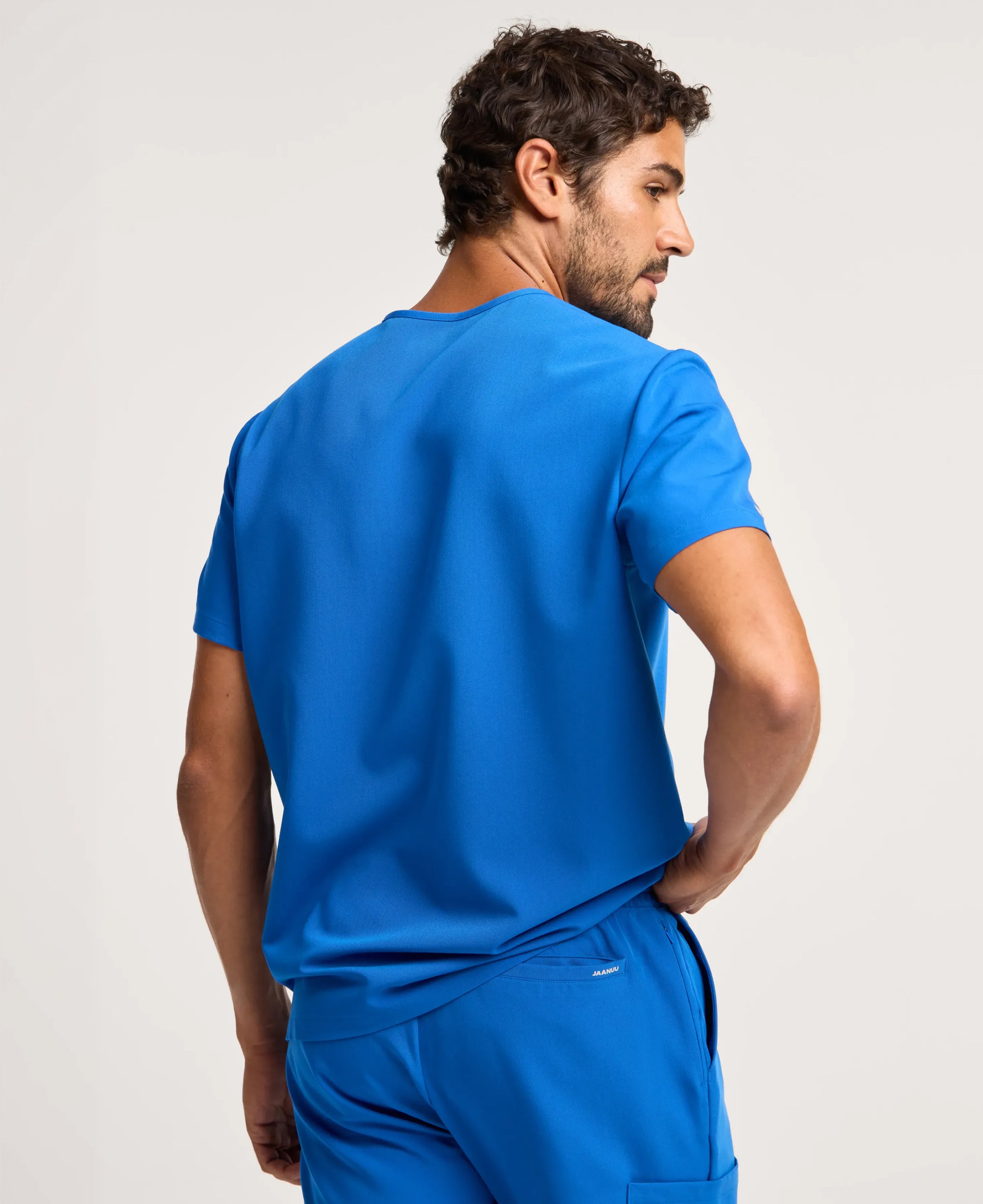 Jaanuu Holmes 1-Pocket Scrub Top in Royal Blue, product photo 3 of 6
