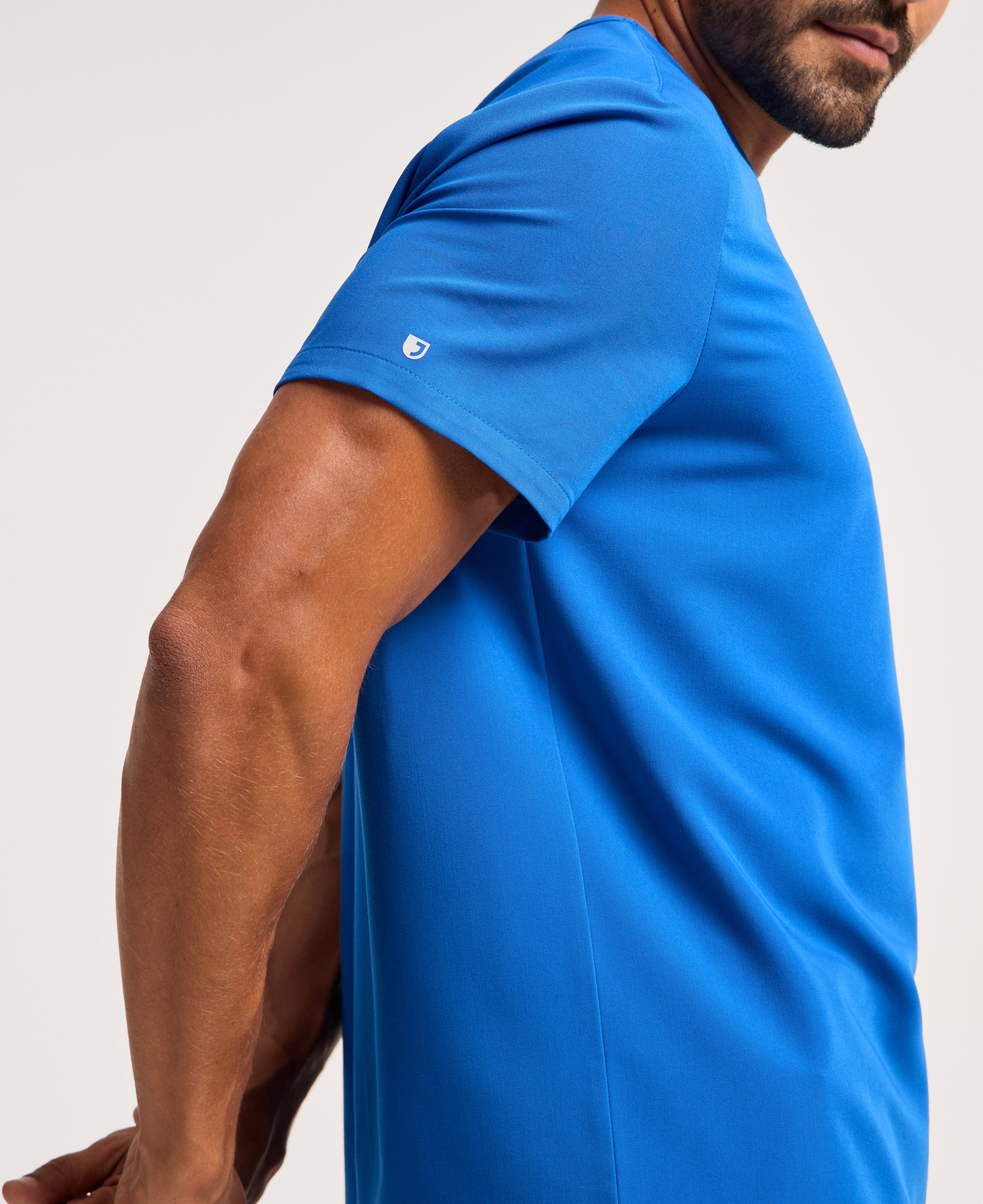 Jaanuu Holmes 1-Pocket Scrub Top in Royal Blue, product photo 4 of 6