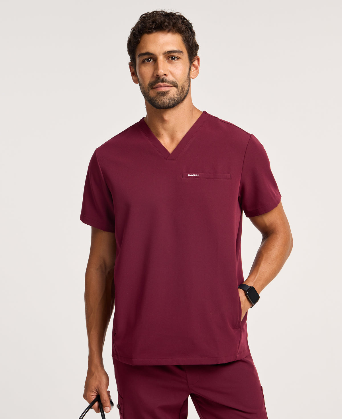Jaanuu Platt 3-Pocket Scrub Top in Burgundy, product photo 1 of 6