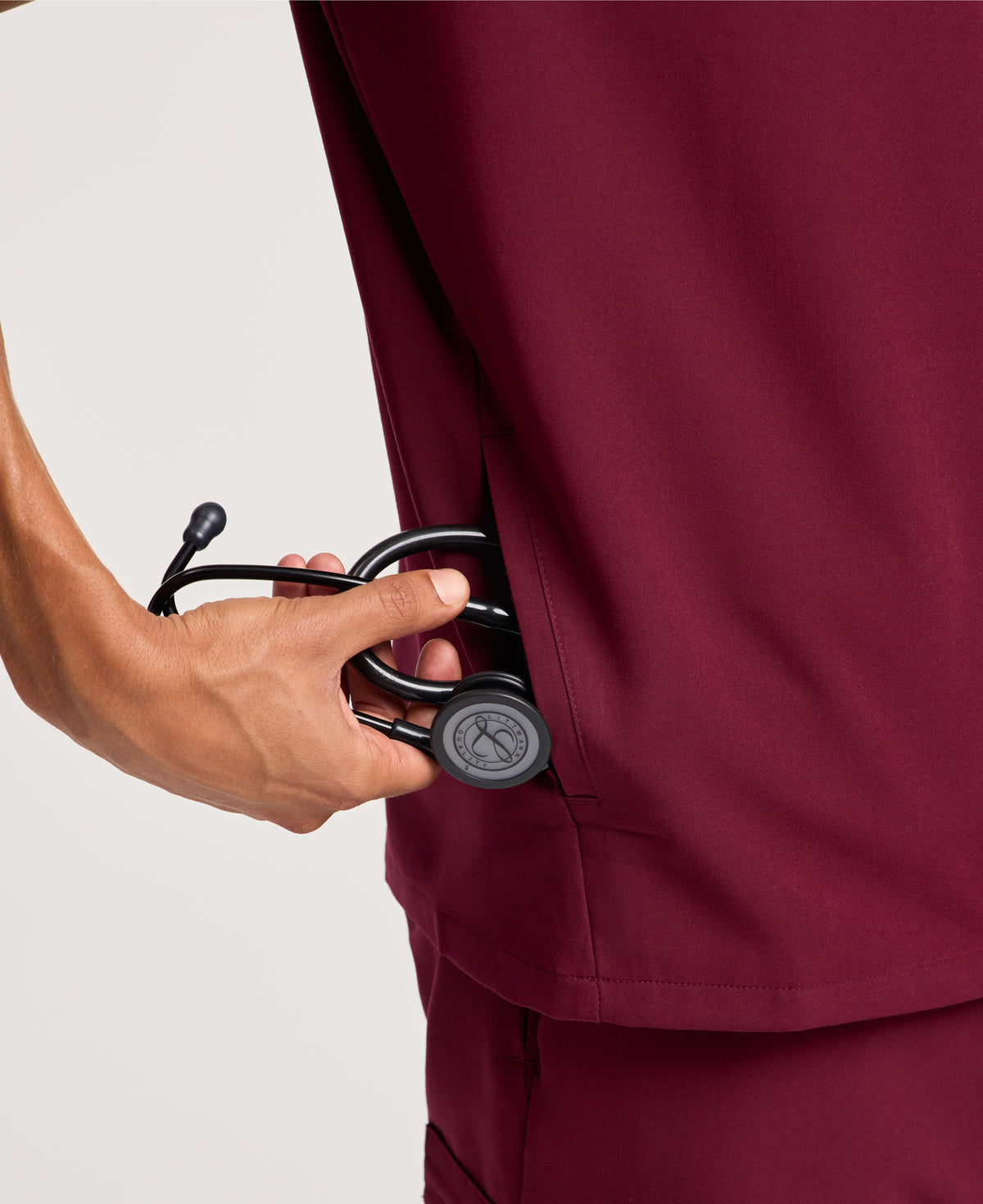 Jaanuu Platt 3-Pocket Scrub Top in Burgundy, product photo 3 of 6
