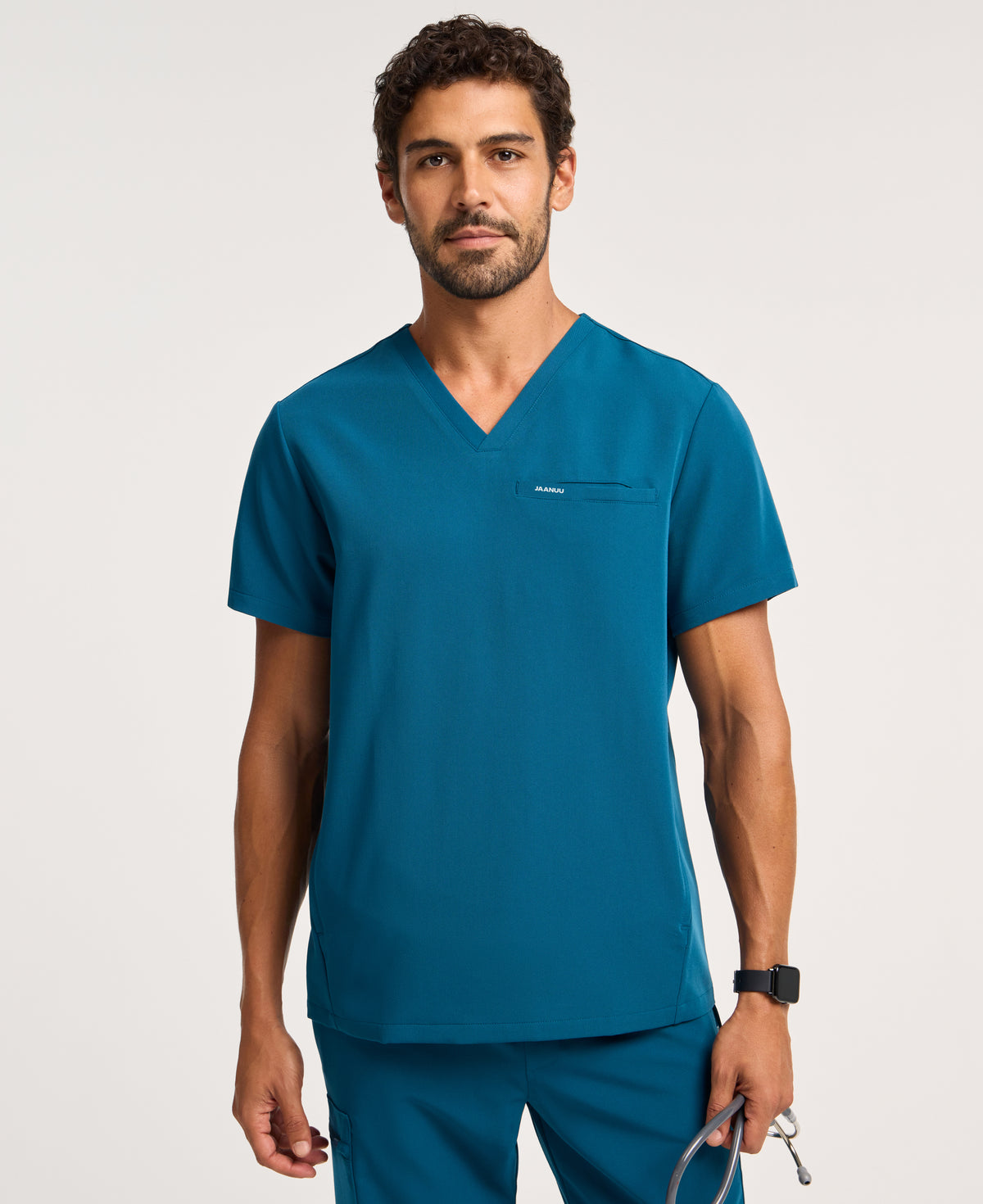Jaanuu Platt 3-Pocket Scrub Top in Caribbean Blue, product photo 1 of 6