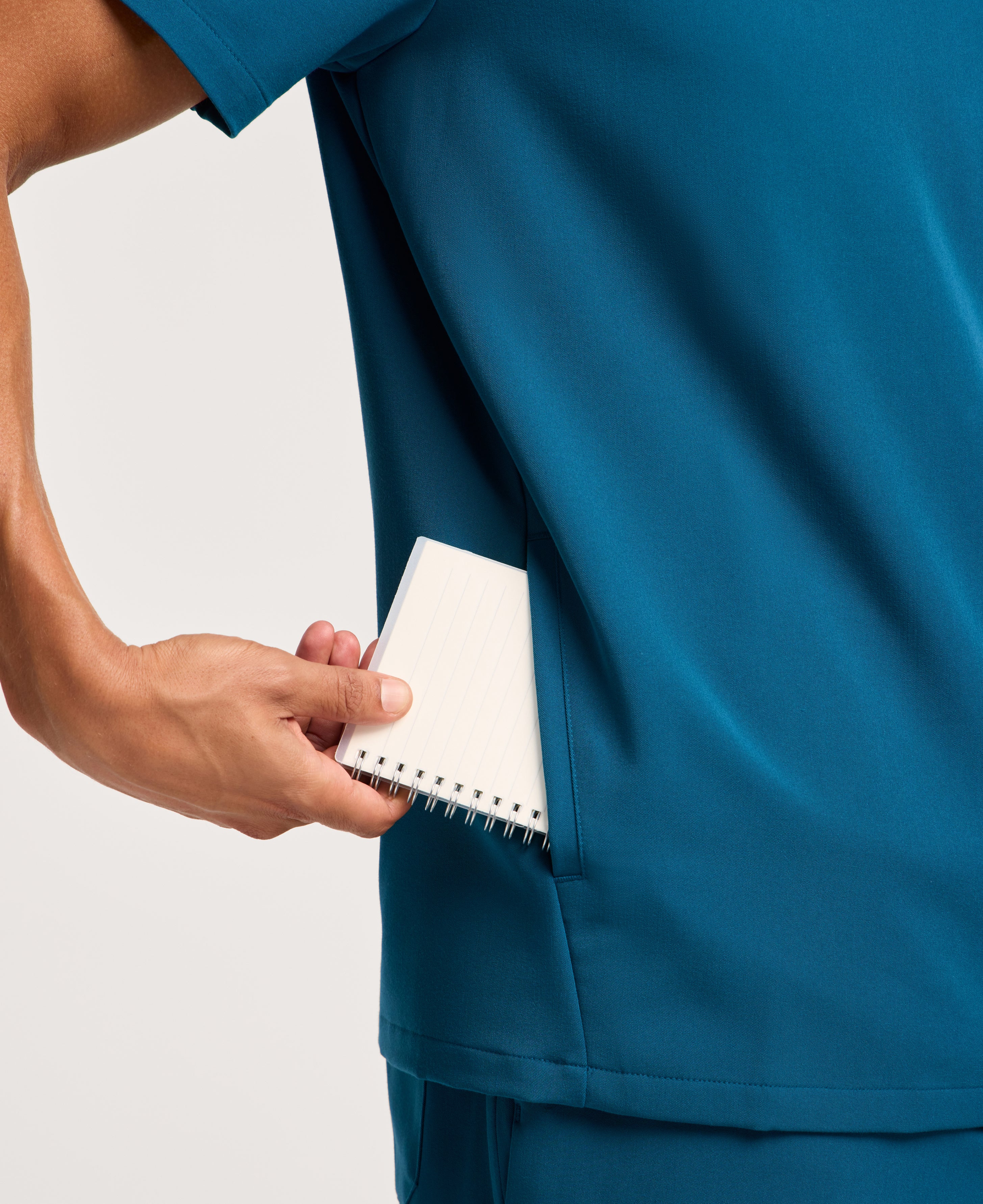 Jaanuu Platt 3-Pocket Scrub Top in Caribbean Blue, product photo 3 of 6