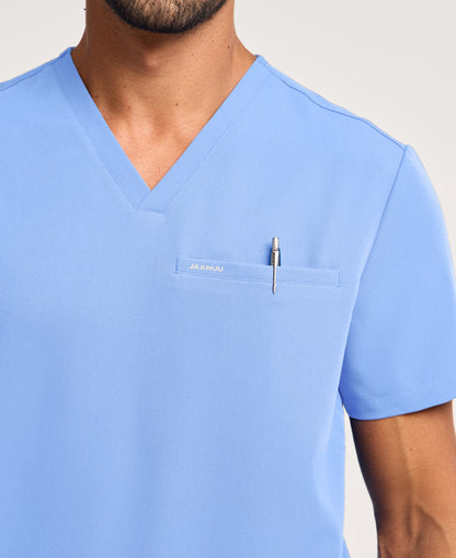 Jaanuu Platt 3-Pocket Scrub Top in Ceil Blue, product photo 2 of 6
