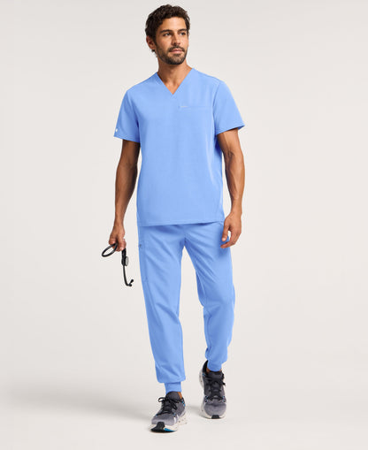 Jaanuu Platt 3-Pocket Scrub Top in Ceil Blue, product photo 4 of 6