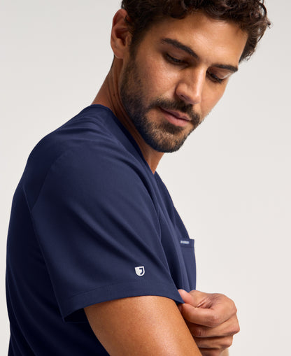 Jaanuu Platt 3-Pocket Scrub Top in Midnight Navy, product photo 4 of 6