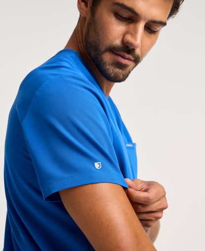 Jaanuu Platt 3-Pocket Scrub Top in Royal Blue, product photo 3 of 6