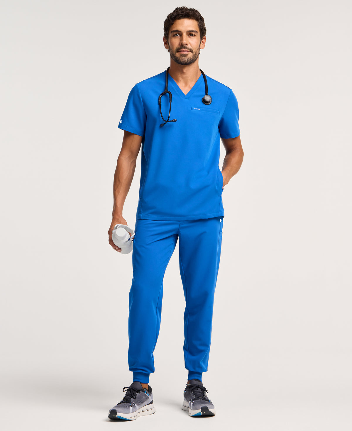 Jaanuu Platt 3-Pocket Scrub Top in Royal Blue, product photo 4 of 6