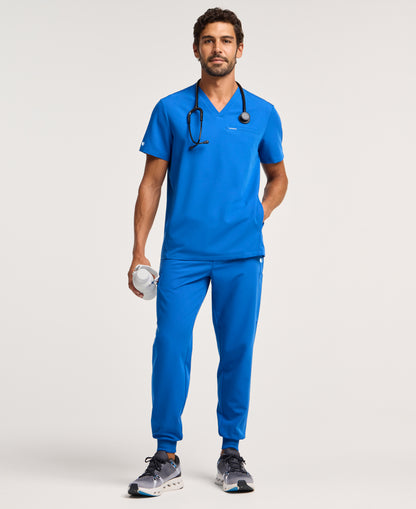 Jaanuu Platt 3-Pocket Scrub Top in Royal Blue, product photo 4 of 6