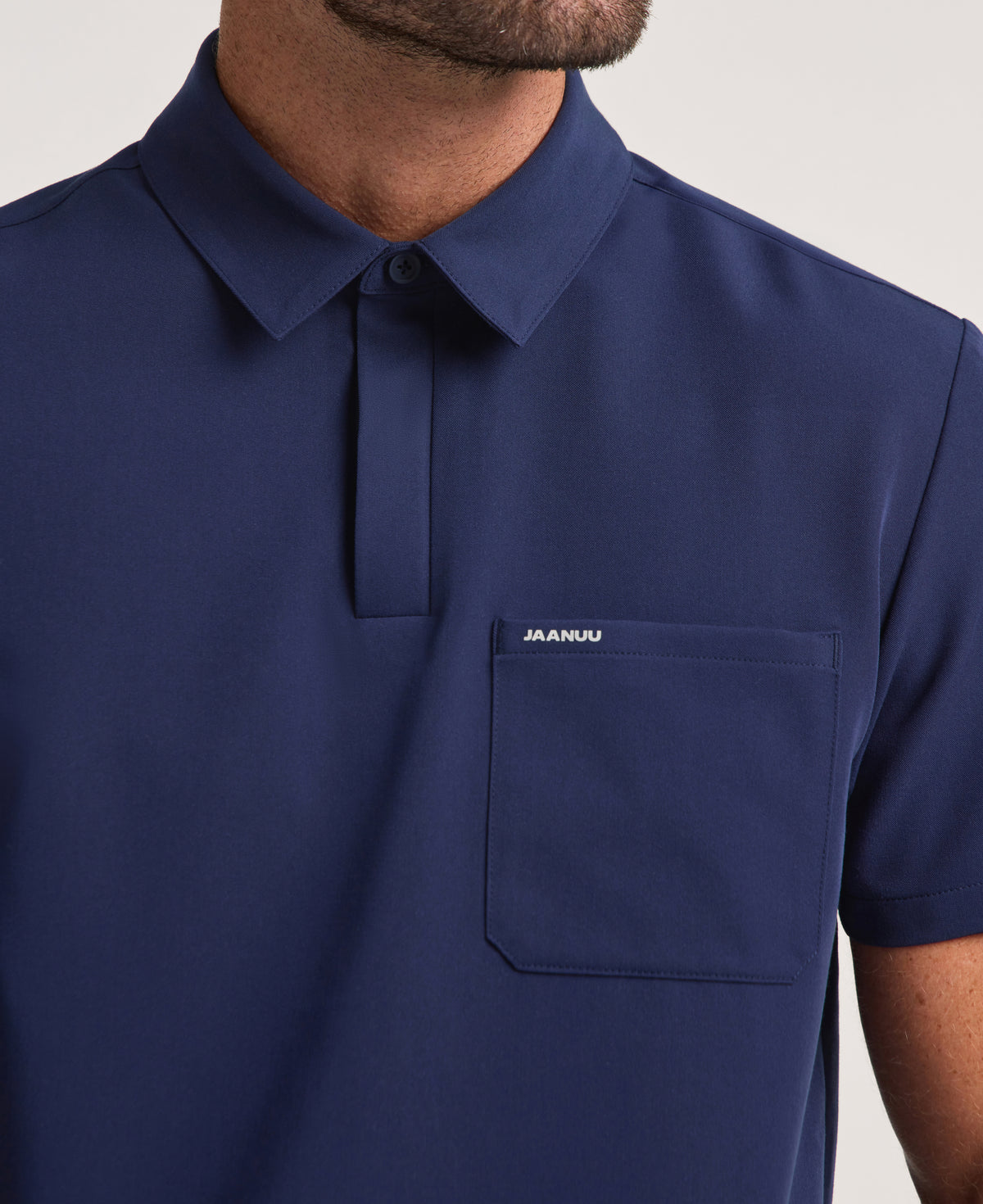 Jaanuu Calderon Polo Scrub Top in Midnight Navy, product photo 3 of 6