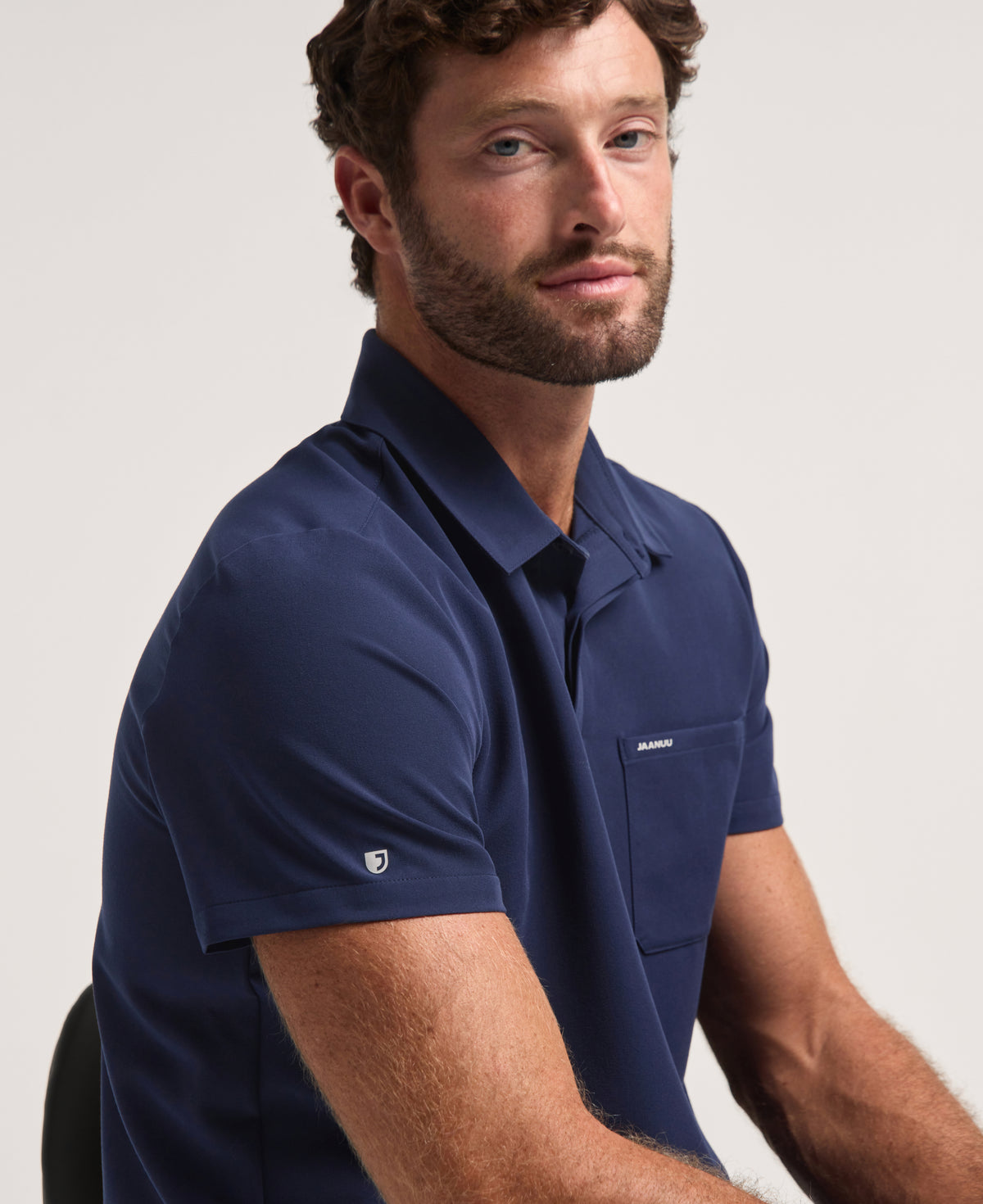 Jaanuu Calderon Polo Scrub Top in Midnight Navy, product photo 5 of 6