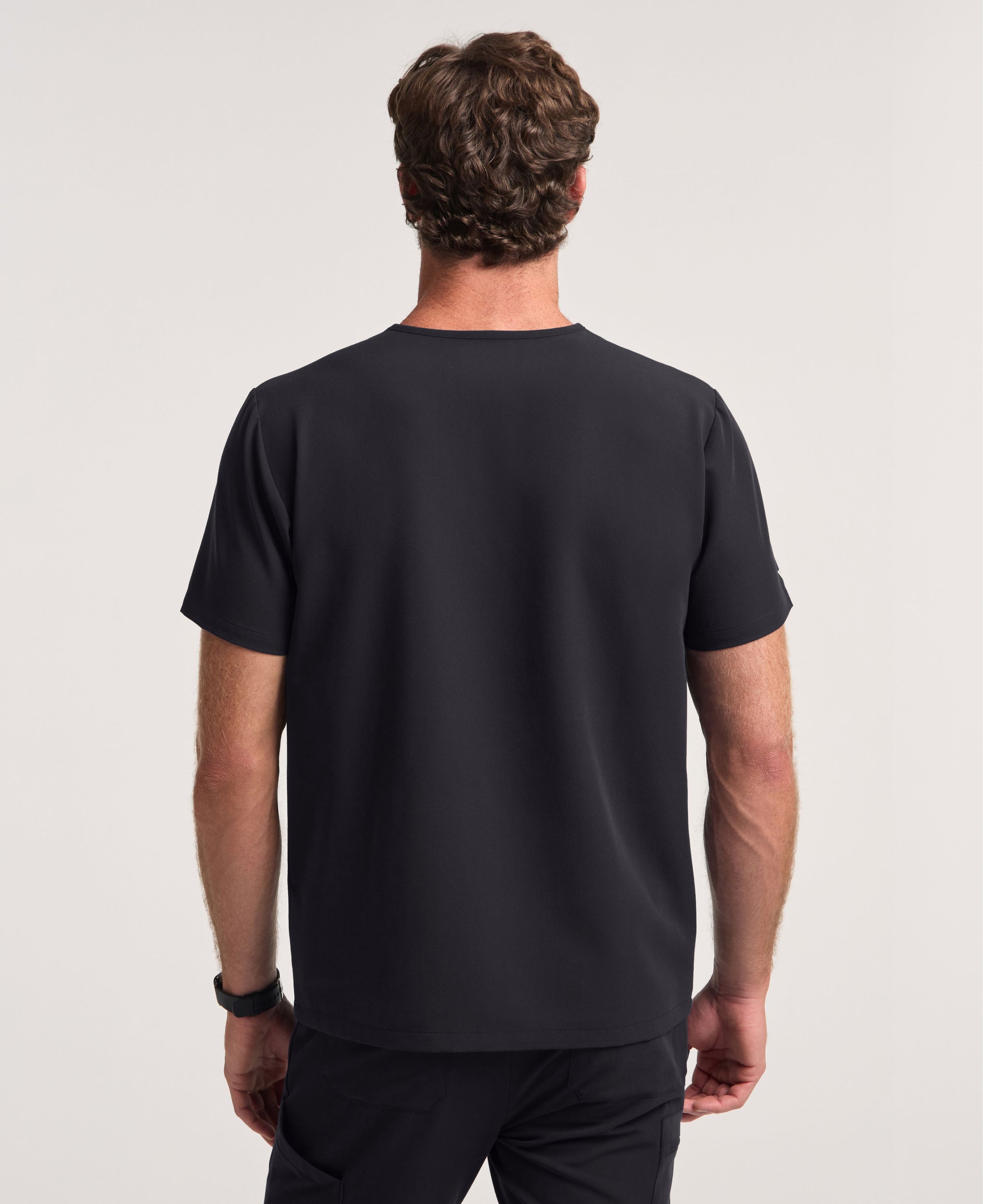 Jaanuu Holmes Slim 1-Pocket Scrub Top in Black, product photo 6 of 6