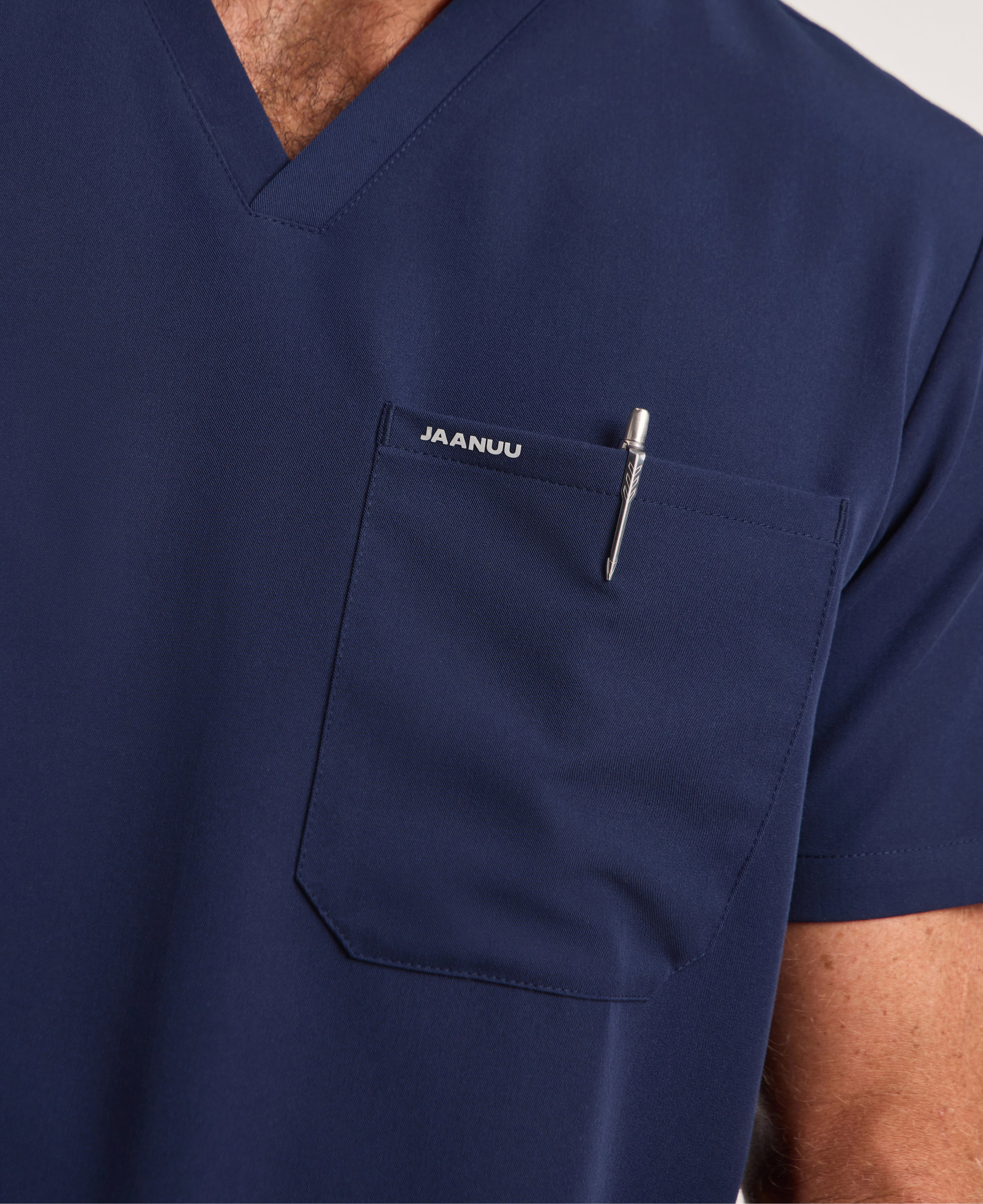 Jaanuu Holmes Slim 1-Pocket Scrub Top in Midnight Navy, product photo 5 of 6