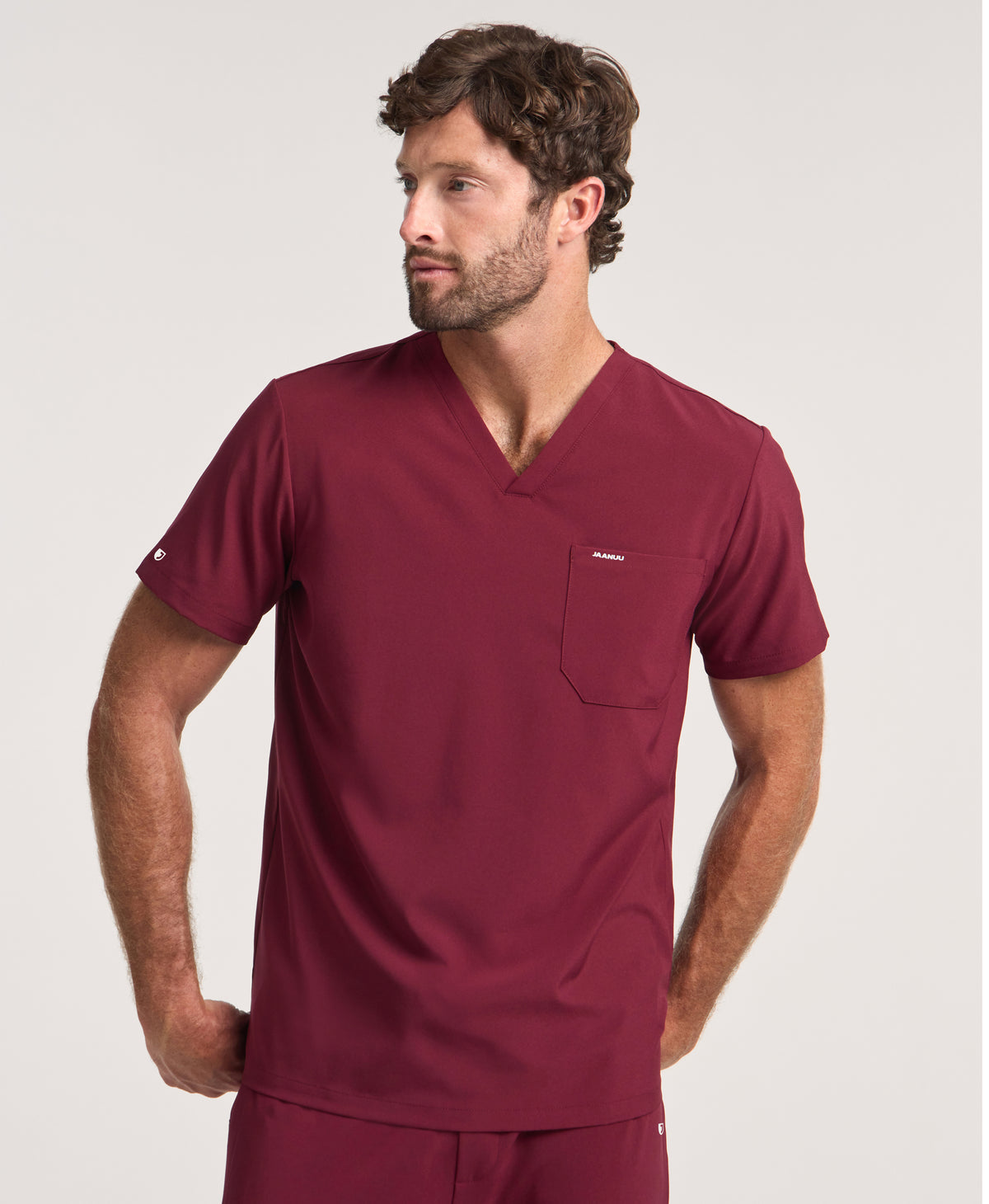 Jaanuu Rhys 1-Pocket Scrub Top in Burgundy, product photo 1 of 6