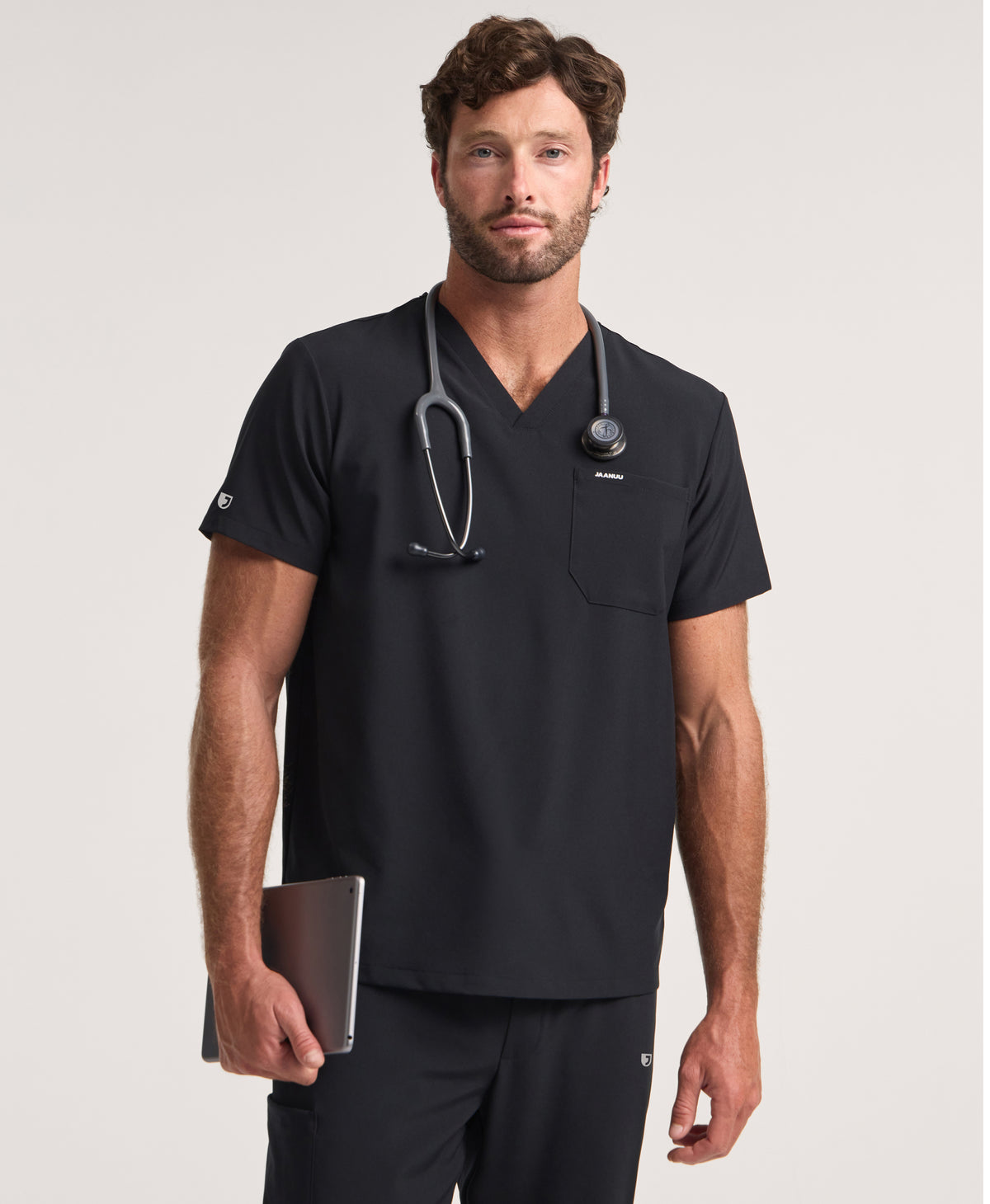 Jaanuu Rhys 1-Pocket Scrub Top in Black, product photo 1 of 6