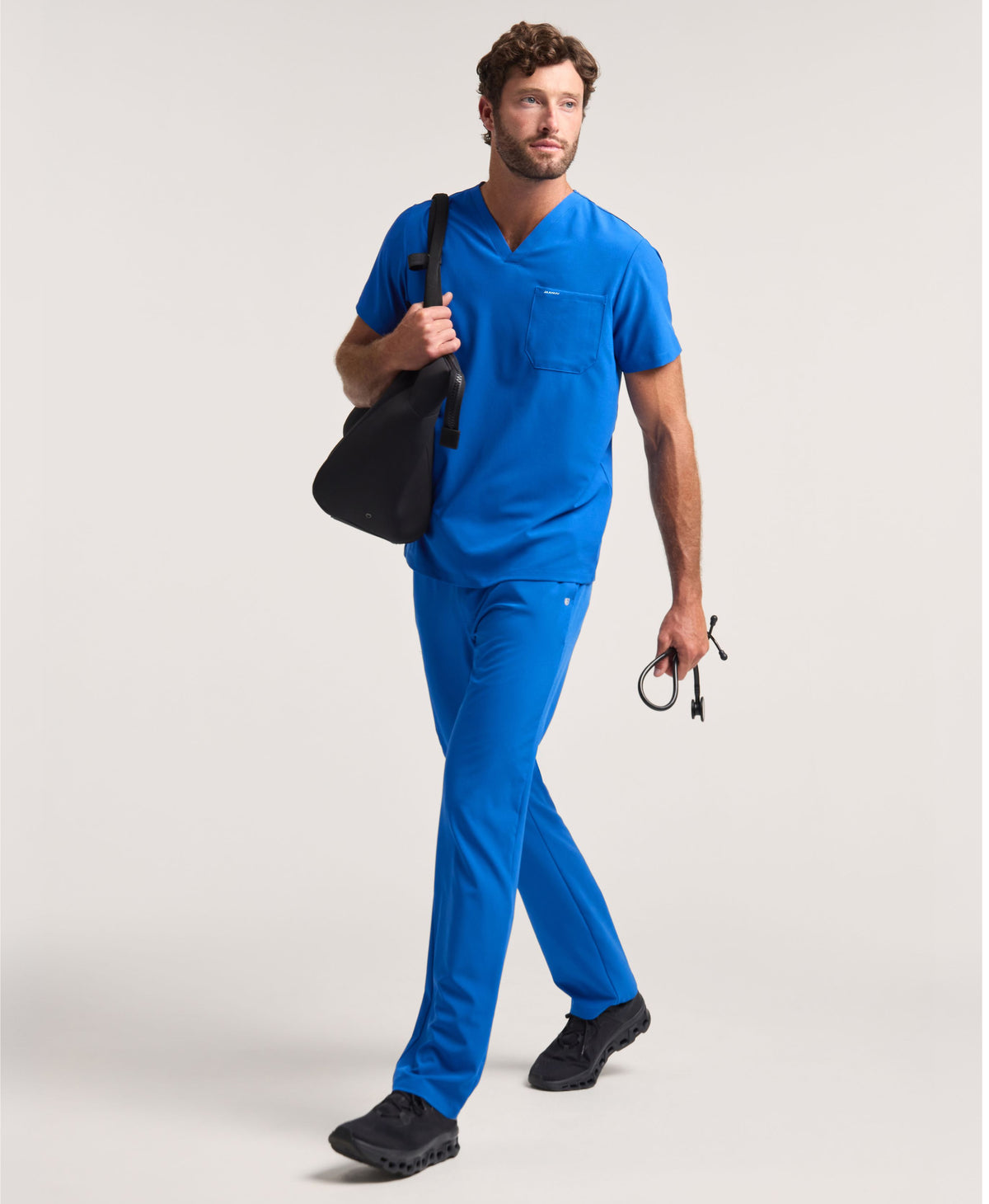 Jaanuu Rhys 1-Pocket Scrub Top in Royal Blue, product photo 1 of 6